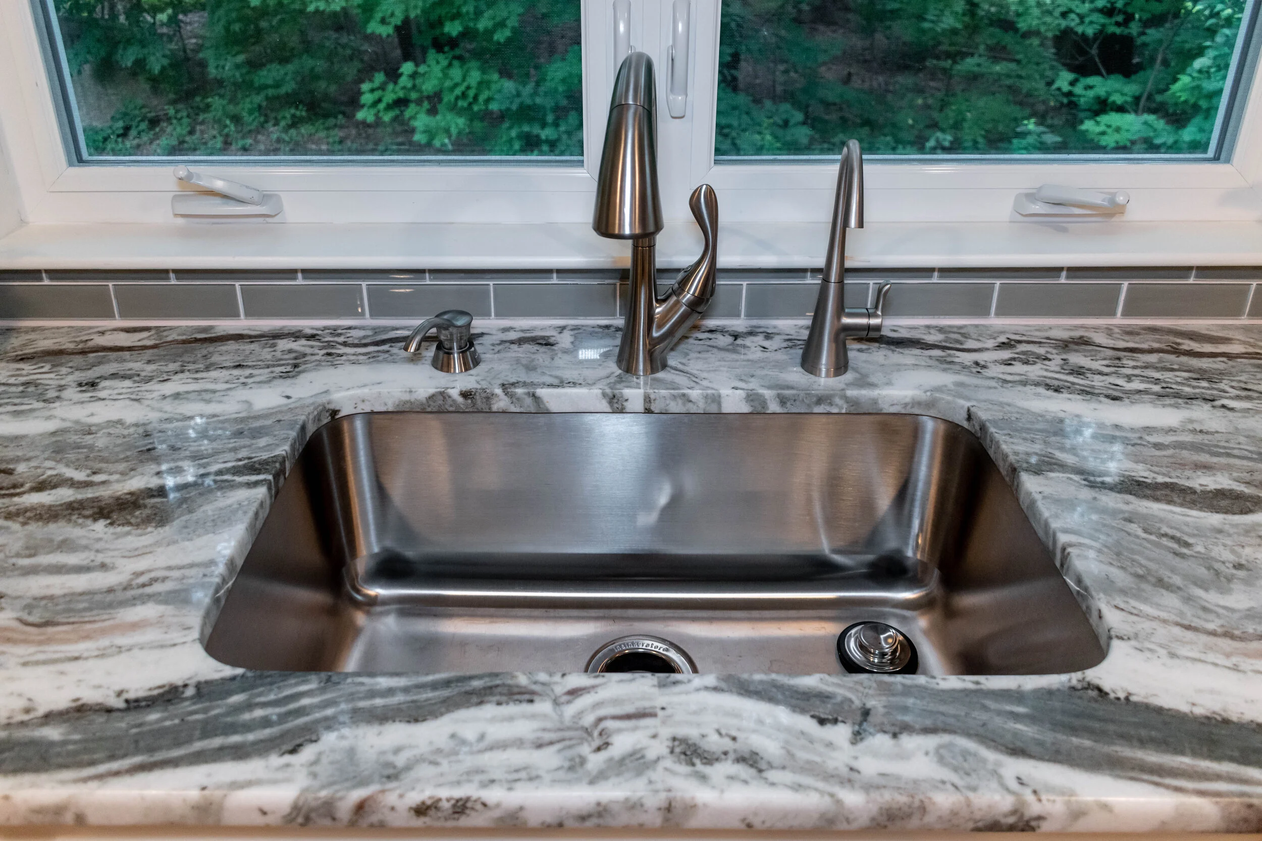 Material: Brown Fantasy Thickness, Finish & Stone Type: 3CM Polished Hard Marble Edge: 1/4" Radius Sink: Client’s Sink: Under-Mount