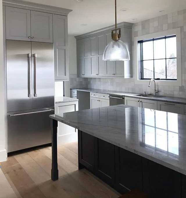 All that light and a view of the space needle from your kitchen sink! So excited to see who gets to enjoy this kitchen!