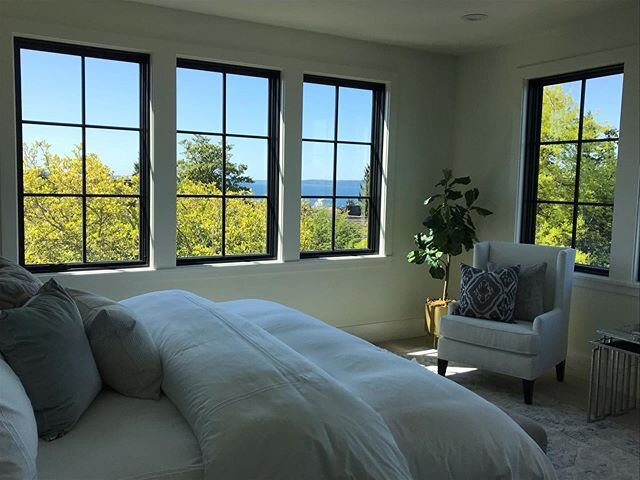 Master bedroom views above the tree tops in Magnolia. We love the mixture of water and greenery from the bed - so calming! 🌿