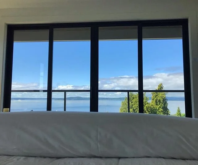 This gloomy Seattle Saturday morning has us day dreaming of the master bed view from our Magnolia property yesterday ☕️☁️