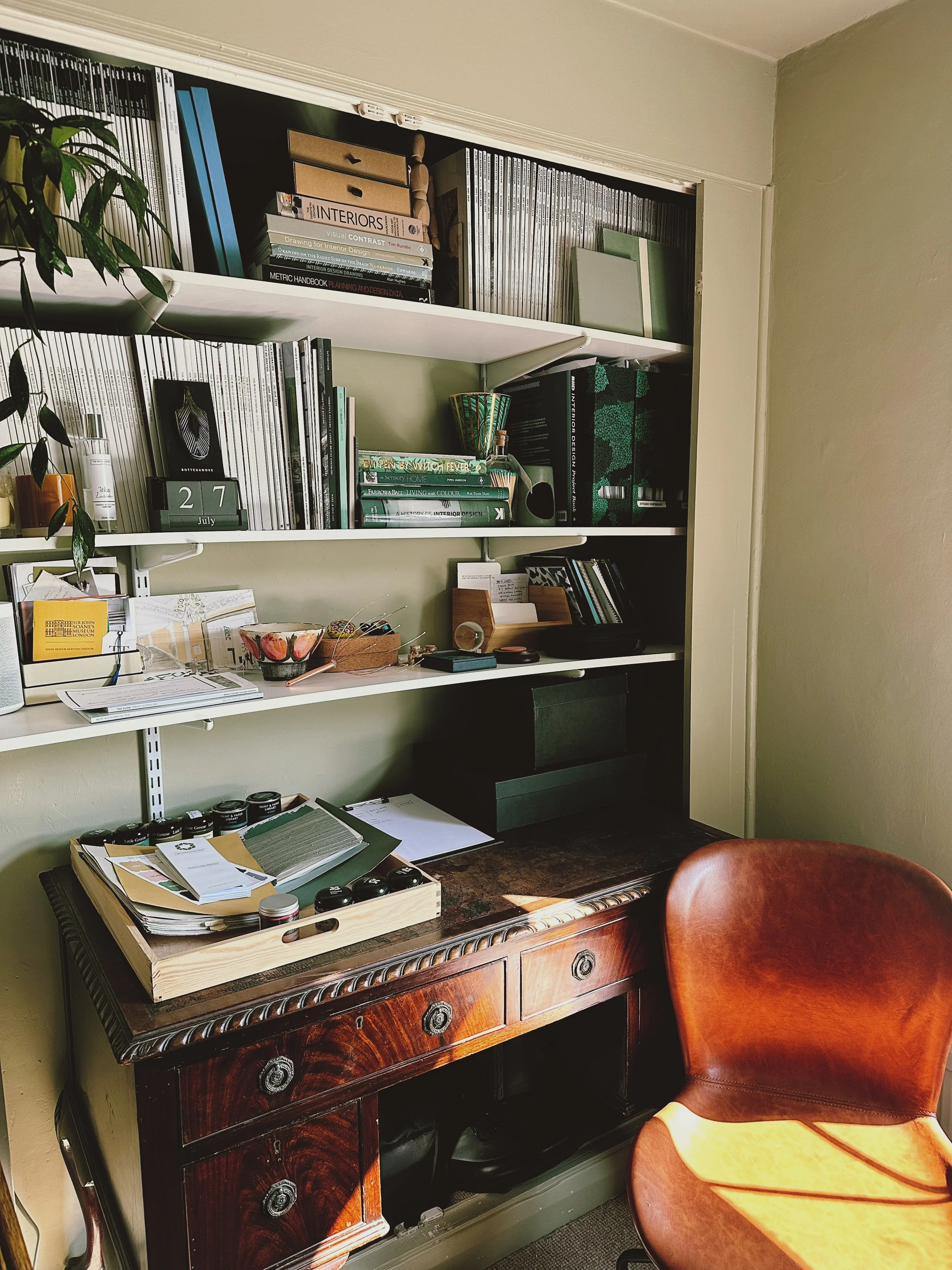 Behind the scene photo of a solo interior design studio.