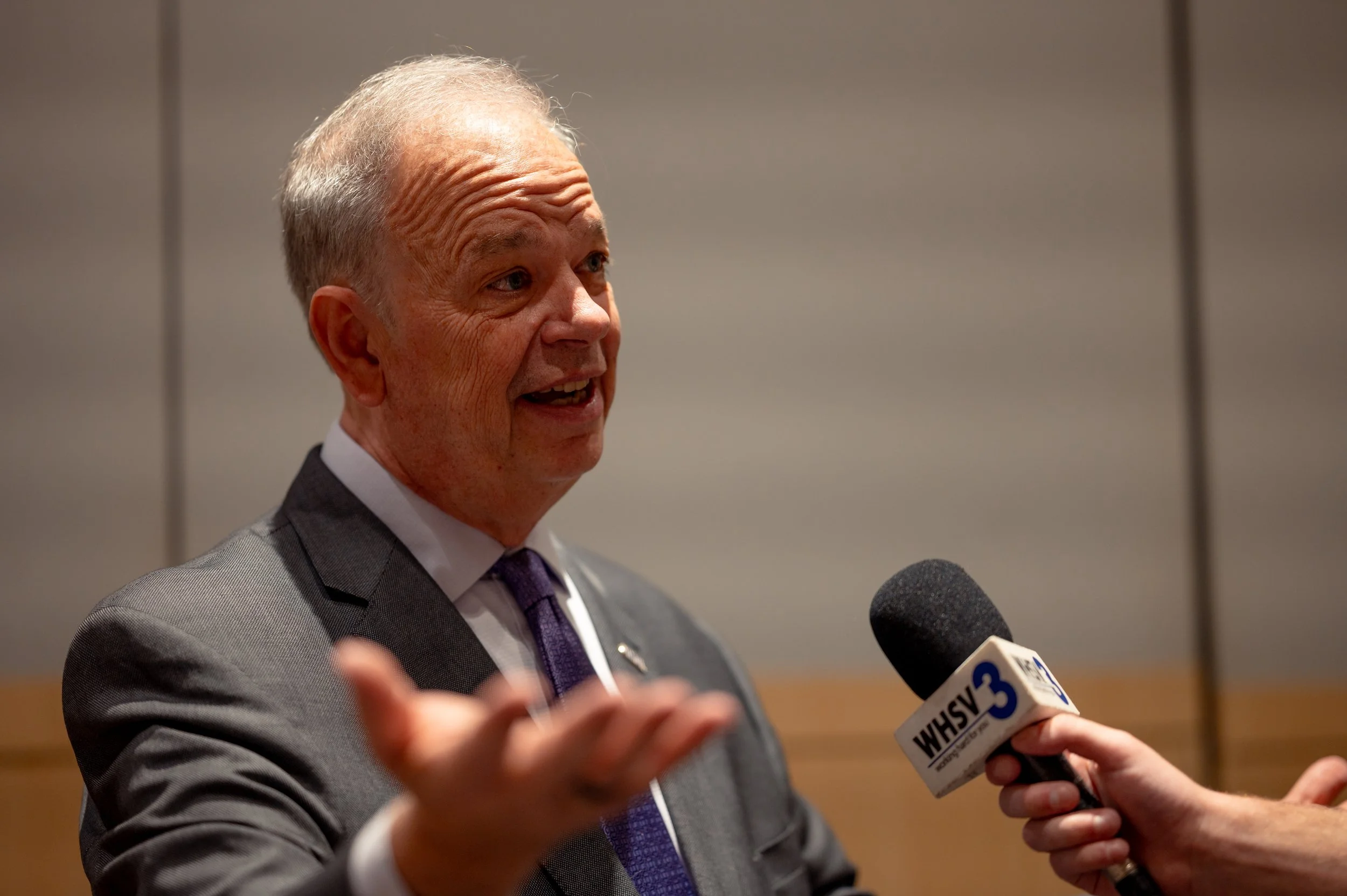  James Madison University President James C. Schmidt, PhD takes questions from the media at a press conference prior to a surprise award ceremony honoring former Chief White House Producer and Deputy Chief of Staff Grace L. Sawyer as the inaugural Ke