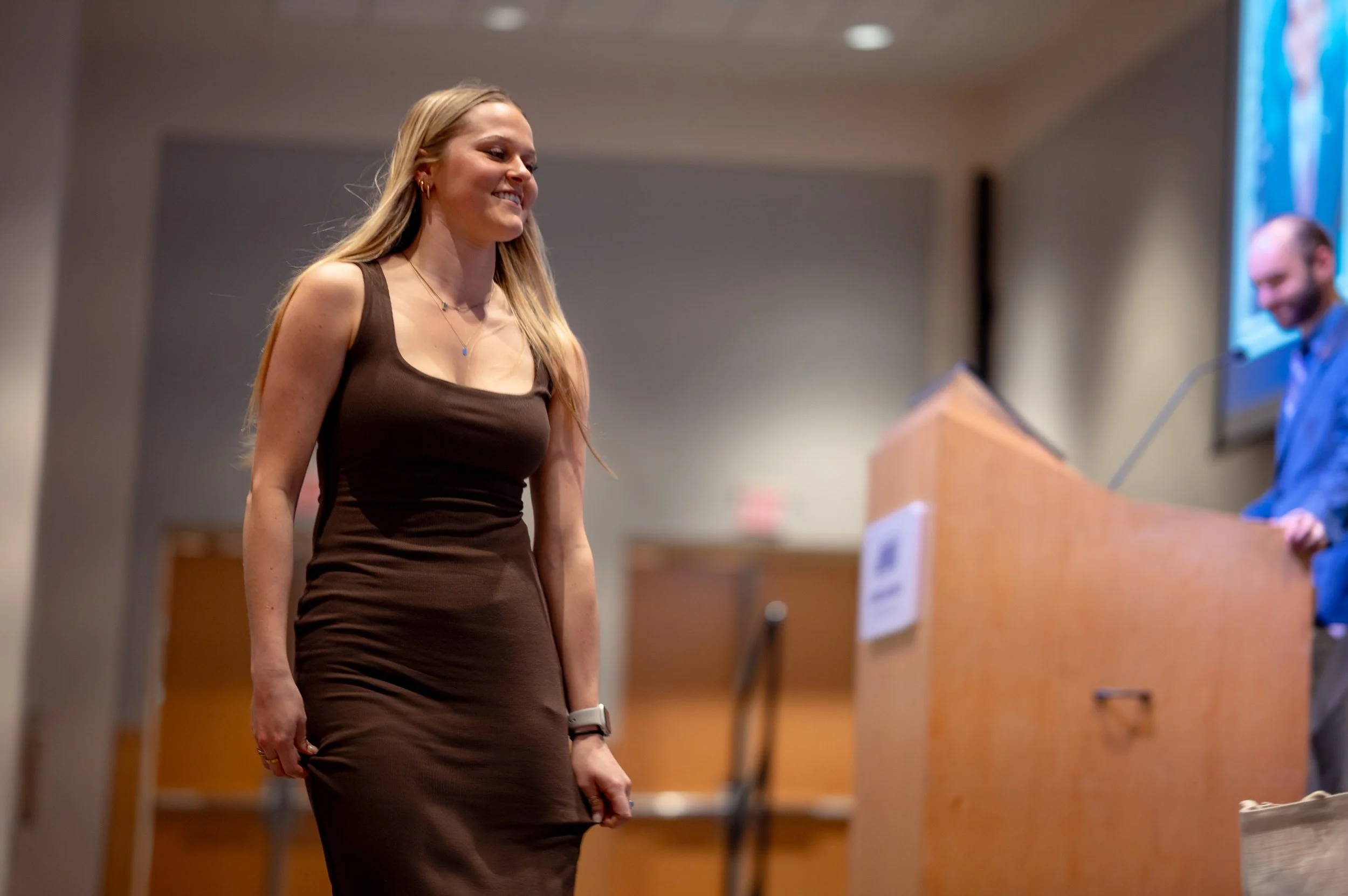  Former Chief White House Producer and Deputy Chief of Staff Grace L. Sawyer walks to the stage as she is awarded the Inaugural Keith B. Jones Award for Excellence in Political Journalism during a ceremony honoring Sawyer as the inaugural recipient i