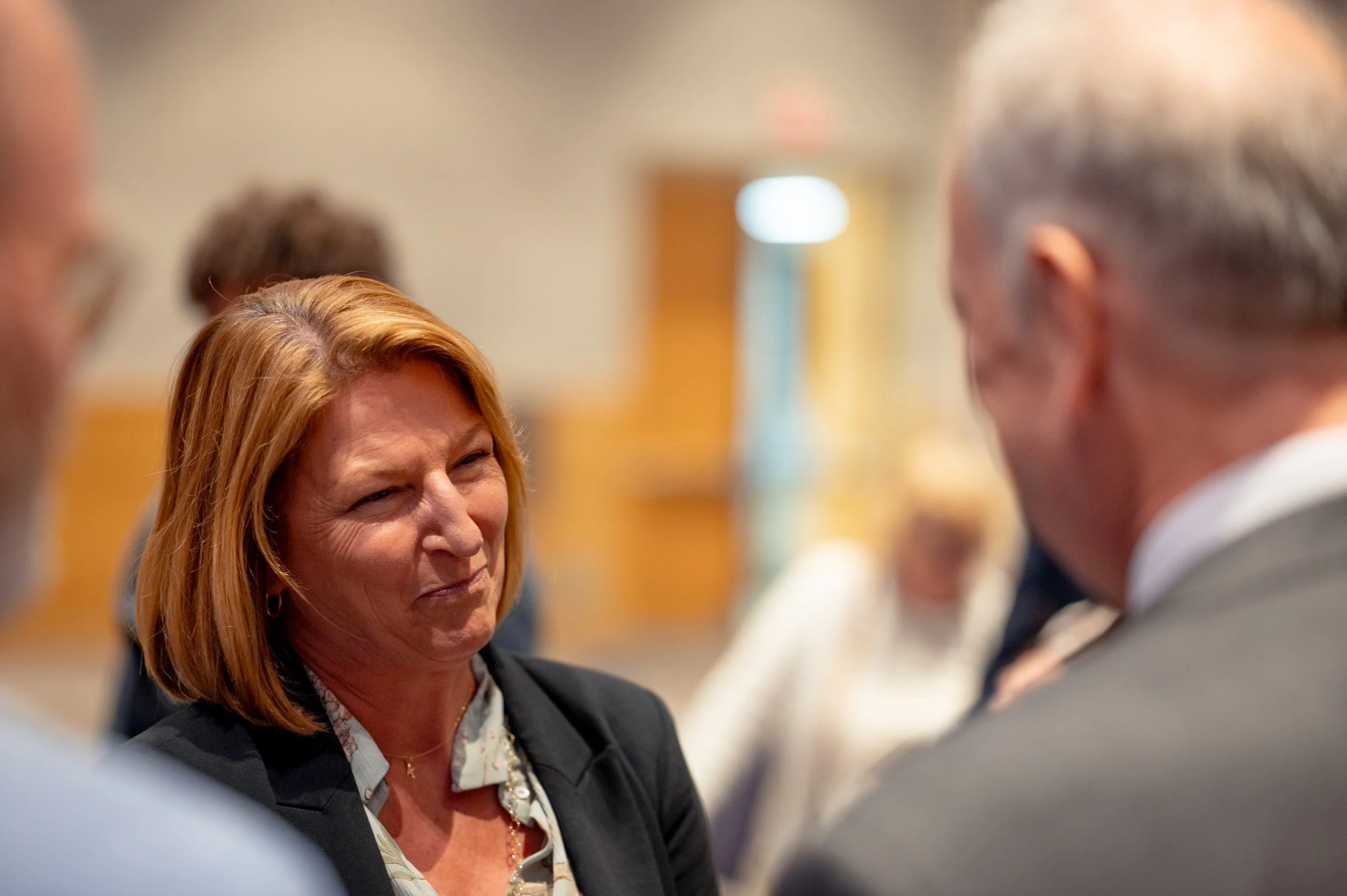  Connie Sawyer talks with James Madison University President James C. Schmidt, PhD after a surprise ceremony in Harrisonburg, Virginia honoring her daughter, former Chief White House Producer and Deputy Chief of Staff Grace L. Sawyer, as the inaugura