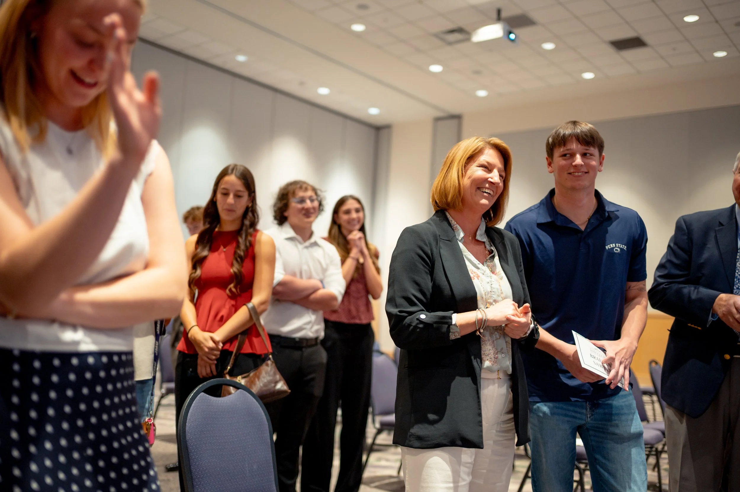  Friends and family of former Chief White House Producer and Deputy Chief of Staff Grace L. Sawyer gather after a surprise ceremony in Harrisonburg, Virginia honoring Sawyer as the inaugural Keith B. Jones Award for Excellence in Political Journalism