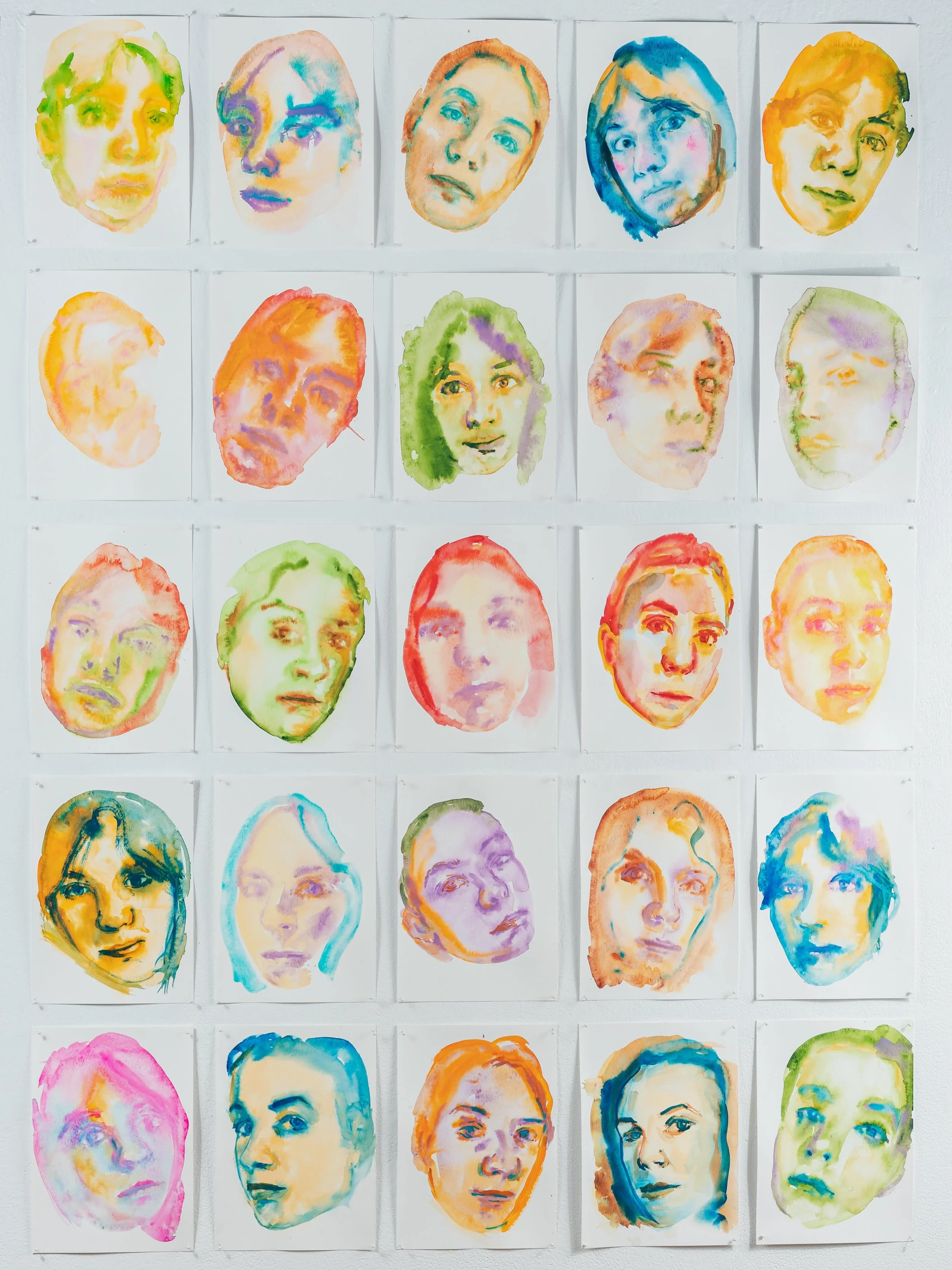 This project began as a daily practice: one watercolour self-portrait every day.

Most of them were painted in small moments between caring for my infant daughter &mdash; while she slept, while I held her, while feeding her. At first, it was simply a