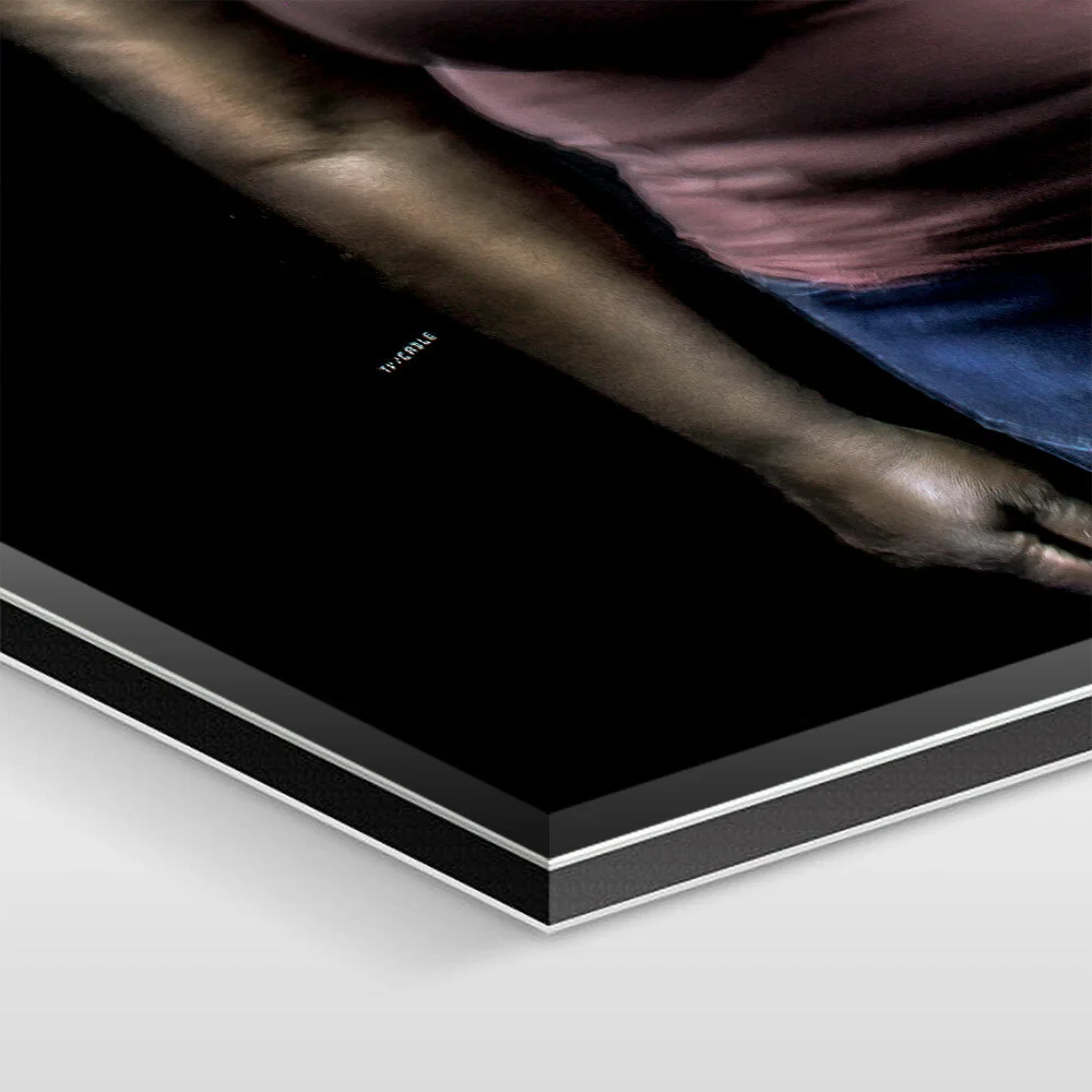 The artwork is mounted under 1/16 inch of acrylic glass, 1/8 inch of aluminum Dibond, and sealed with elastic silicone.