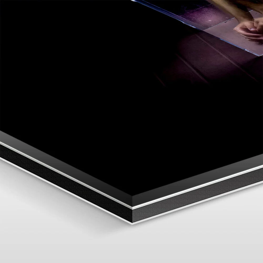 The artwork is mounted under 1/16 inch of acrylic glass, 1/8 inch of aluminum Dibond, and sealed with elastic silicone.