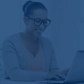 Black-female-teacher-on-computer-3-e1562302973386.jpg