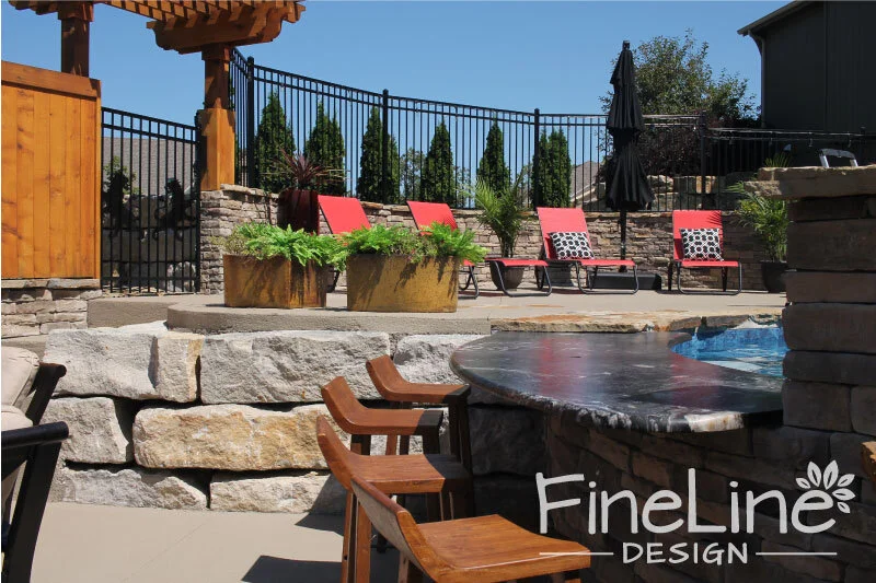Kansas-City-landscaping,-Fineline-Design,-pool-design,-vinyl-pool,-swim-up-bar,-sunken-patio,-sheet-fountains,-custom-wood-work-(10).jpg