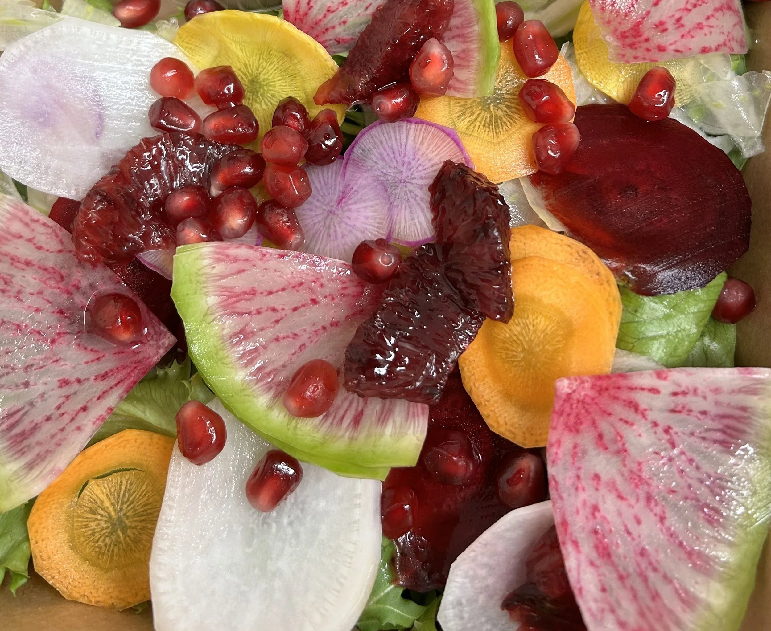 Mixed Green Salad with Shaved Vegetables and Pomegranate with Champagne Vinaigrette