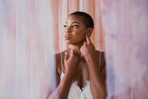 Strawberry Peach Hand-Dyed Backdrop at a Bright and Bold Elopement