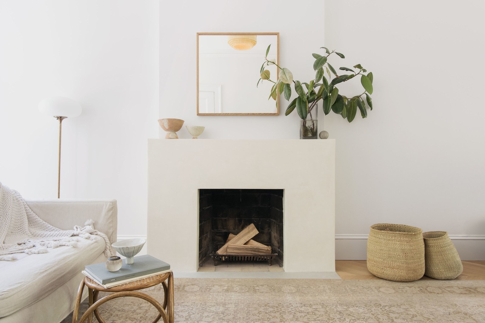  For the minimalist fireplace mantel, Roberts found a skilled craftsman to apply tadelakt, a waterproof plaster, by hand in the Moroccan tradition. "The cost was comparable to tile but it gave it such a unique look," she says. 