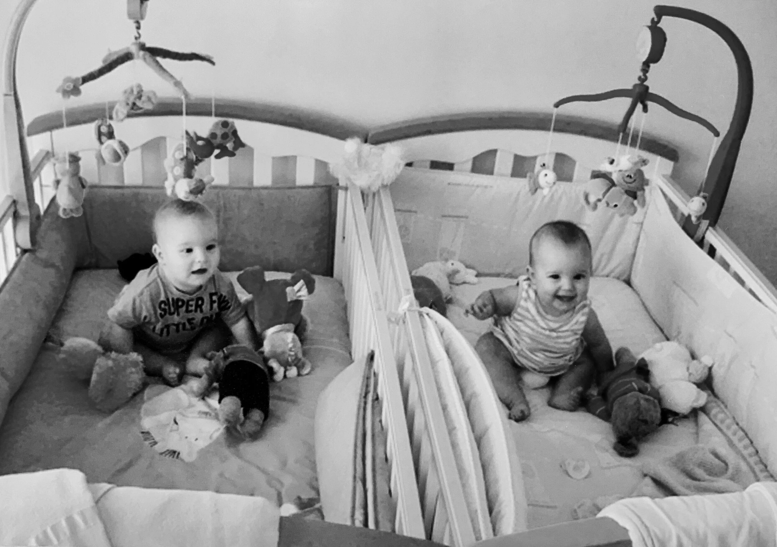 Twins in their cots.jpeg