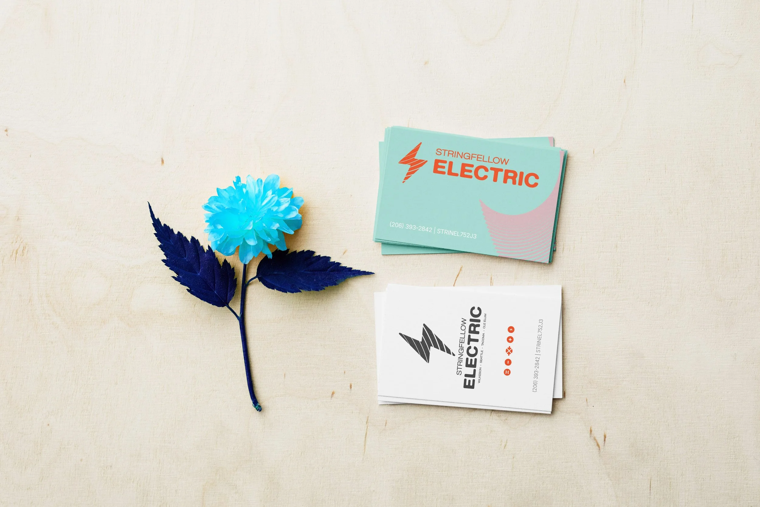 STRINGFELLOW_Business Cards on Plywood Mockup-min.jpg