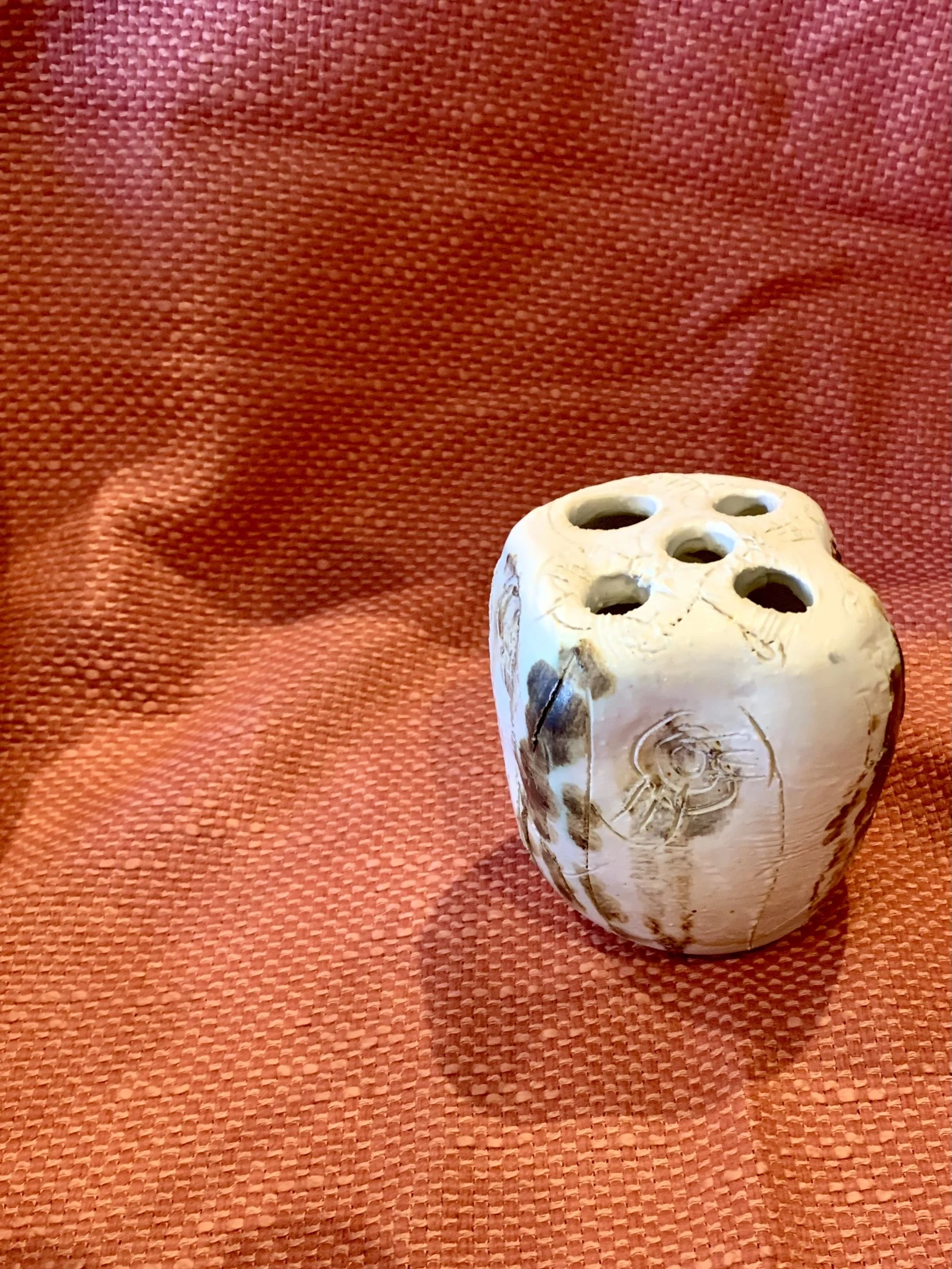 Thrown and altered stem vase with texture and oxide colouring