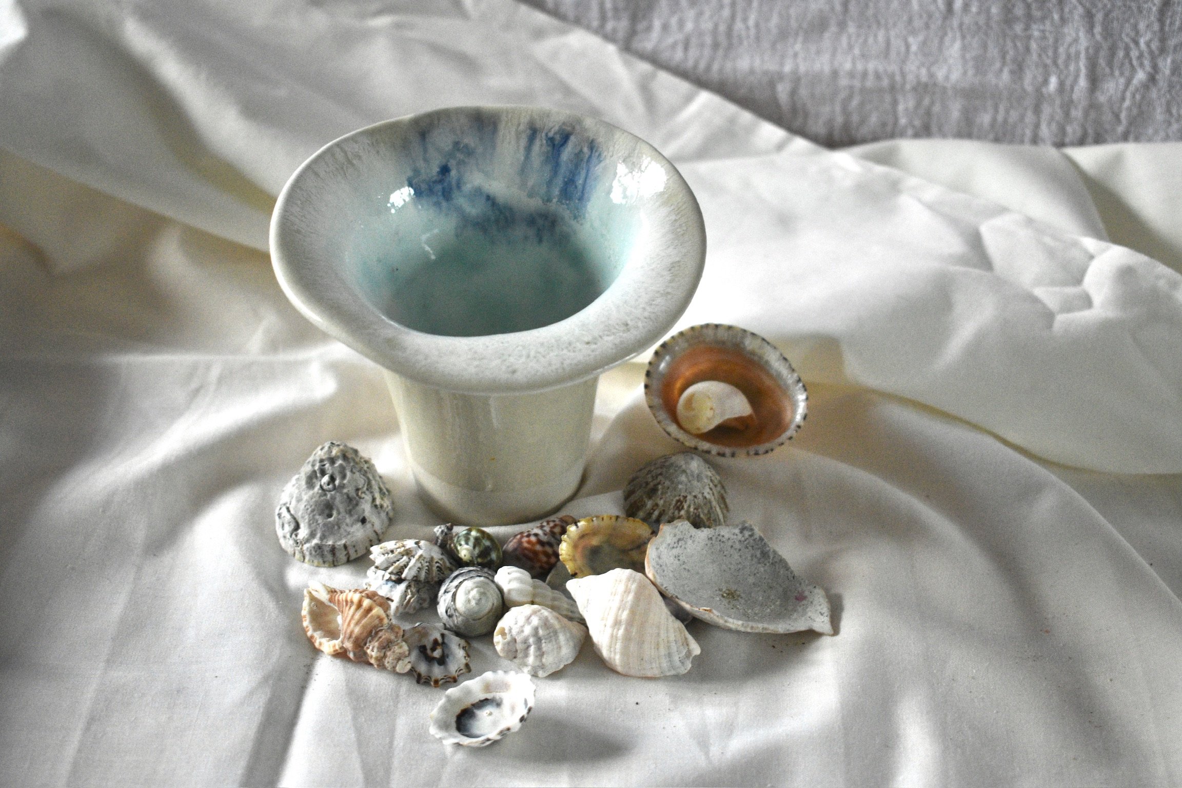Small shell form, 2025. Thrown and altered stoneware with oxides, and glaze