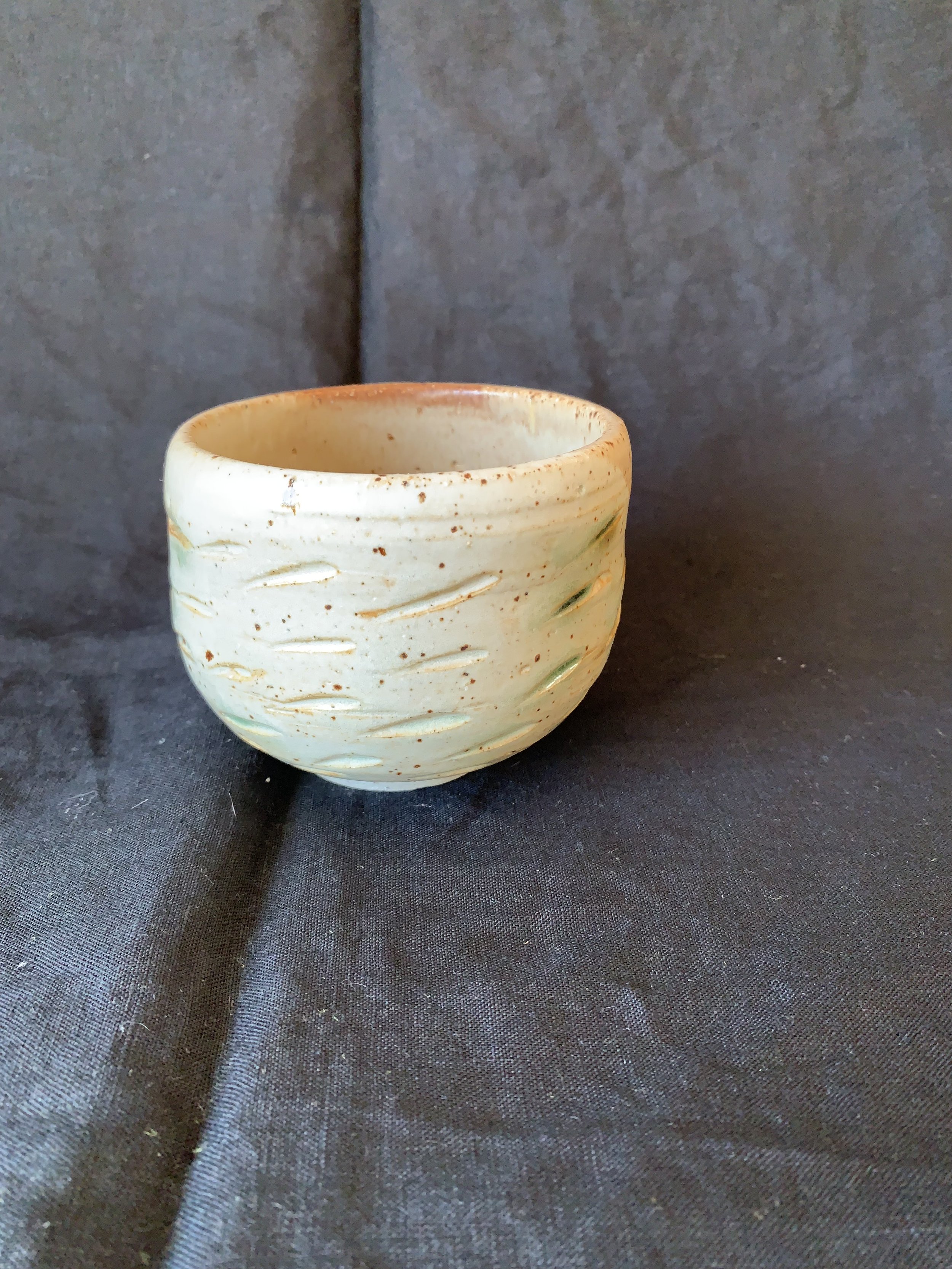 Stoneware cup decorated with oxides made from reclaimed metals