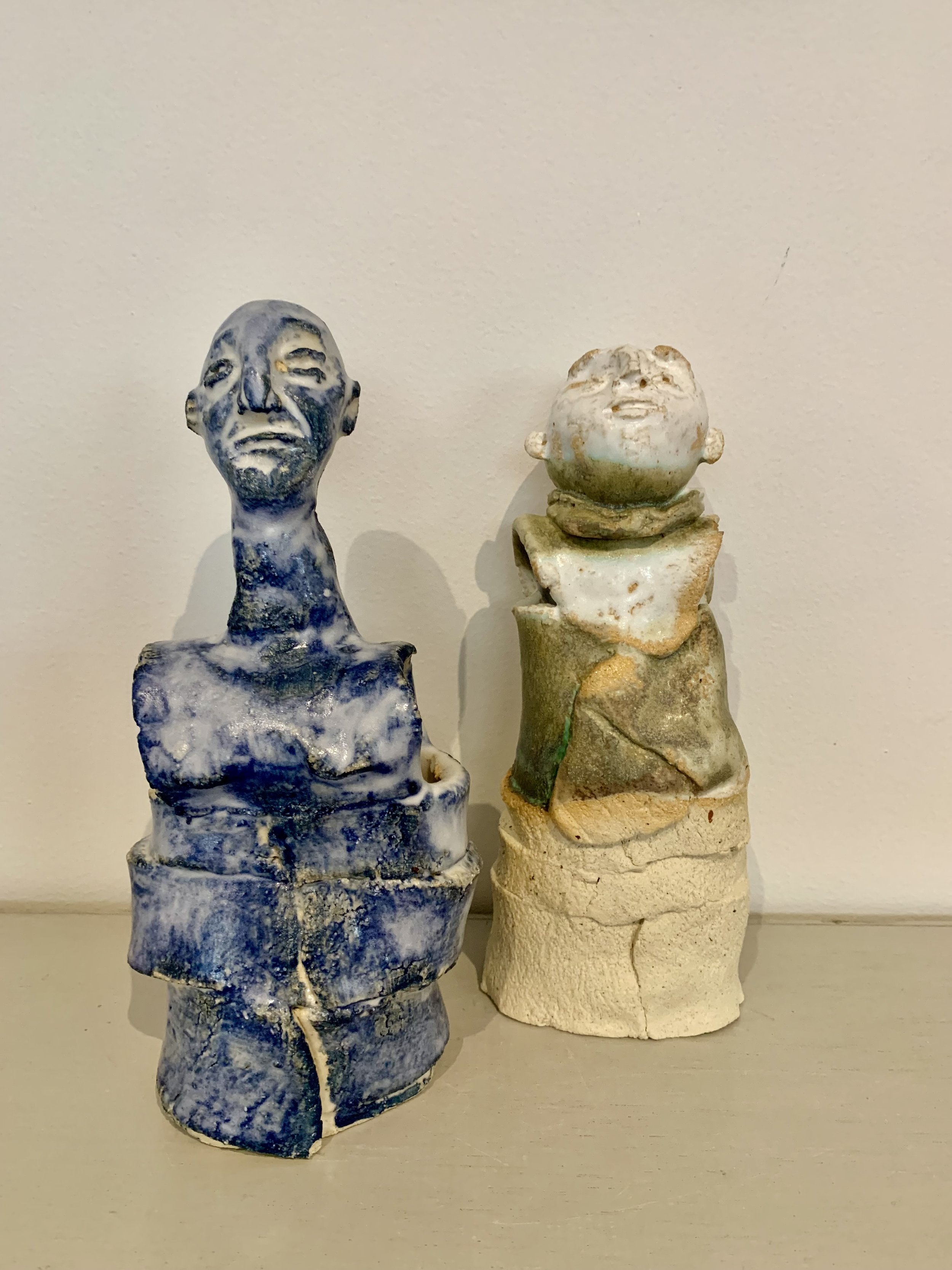 Blue figure and Bronze figure, 2025, Raku clay, coloured slip, glaze