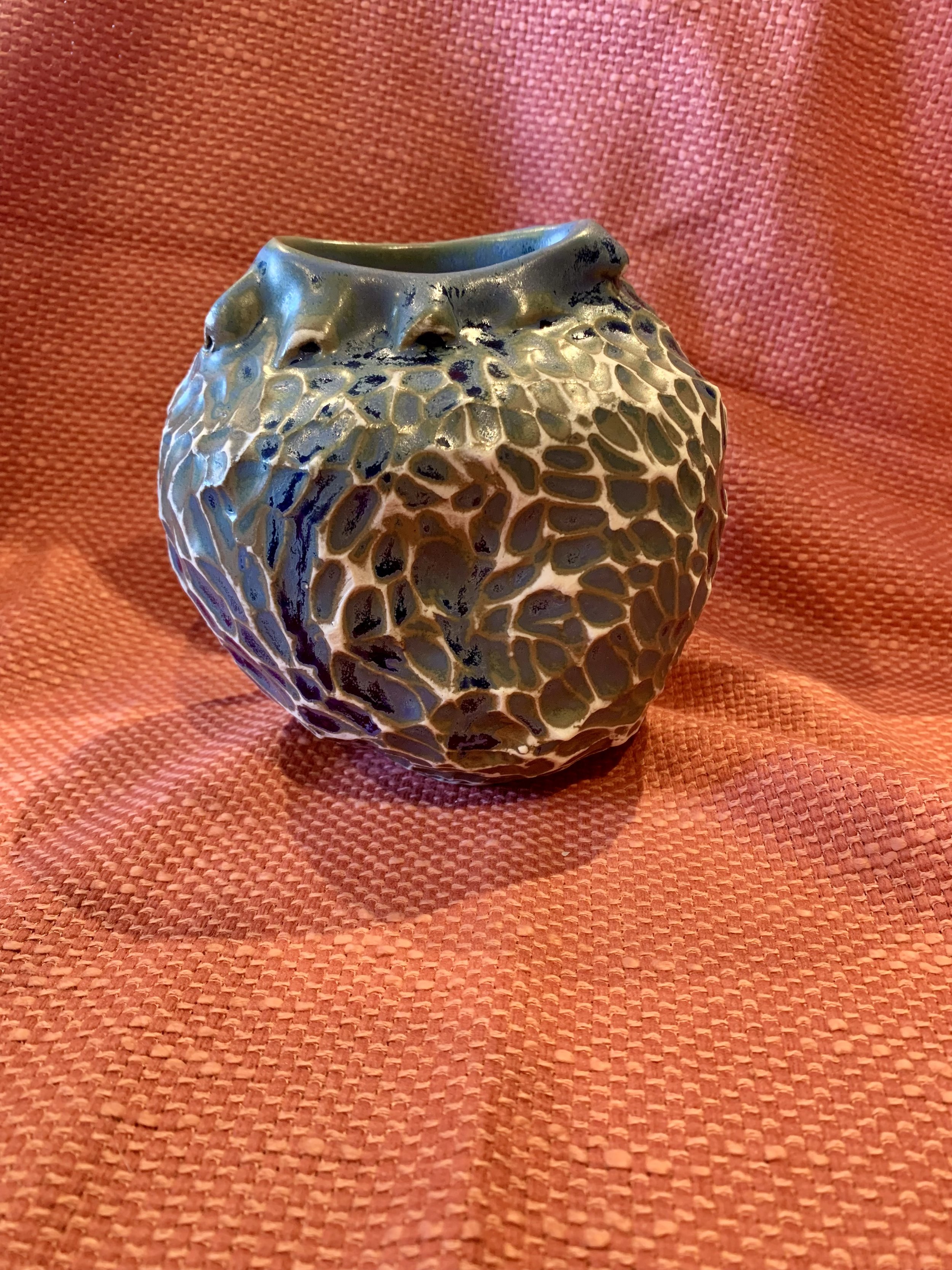 Frill necked and softly faceted thrown and altered vase, glazed stoneware