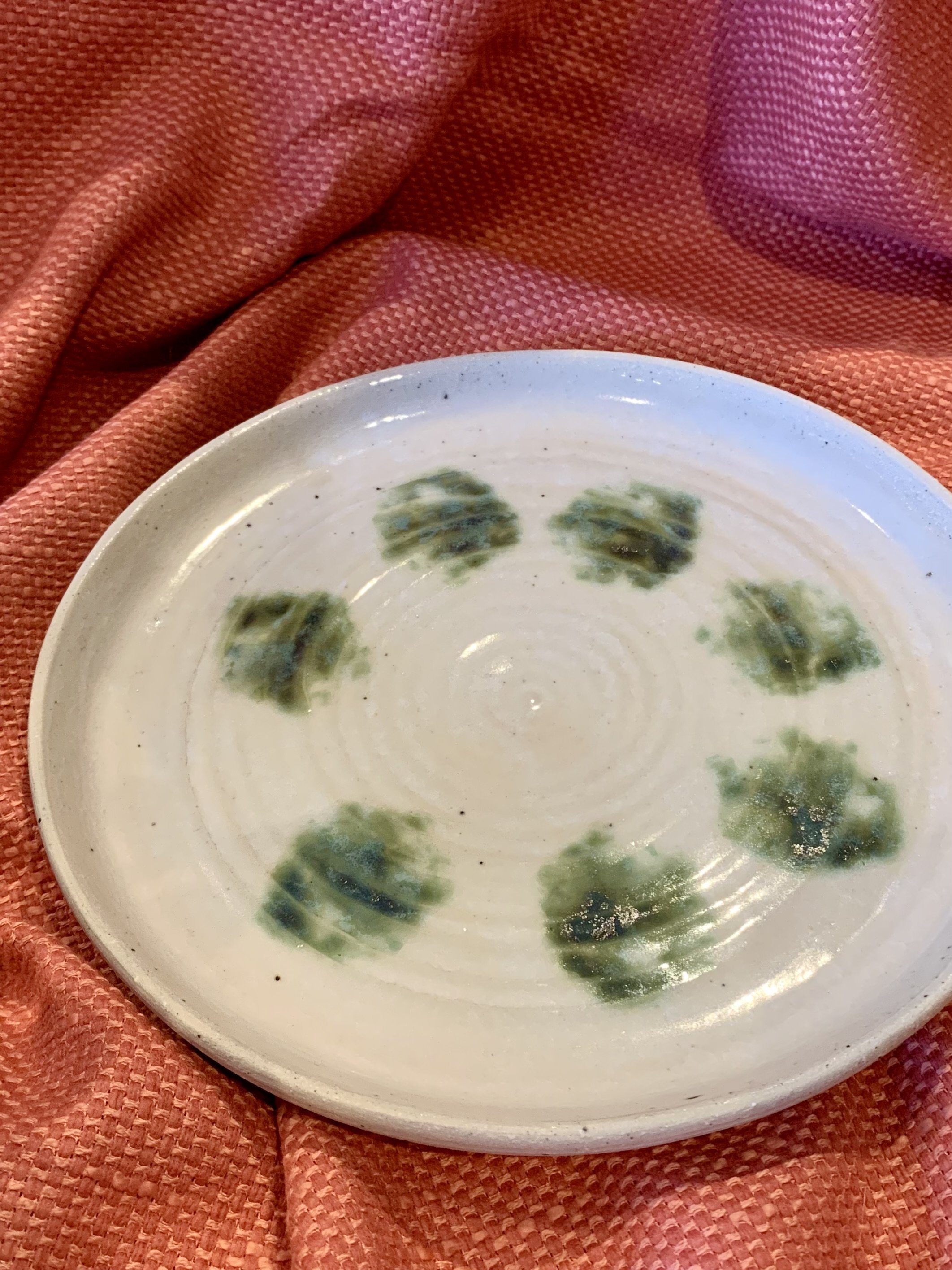 Serving plate with copper oxide decoration on shino and ash glazed stoneware