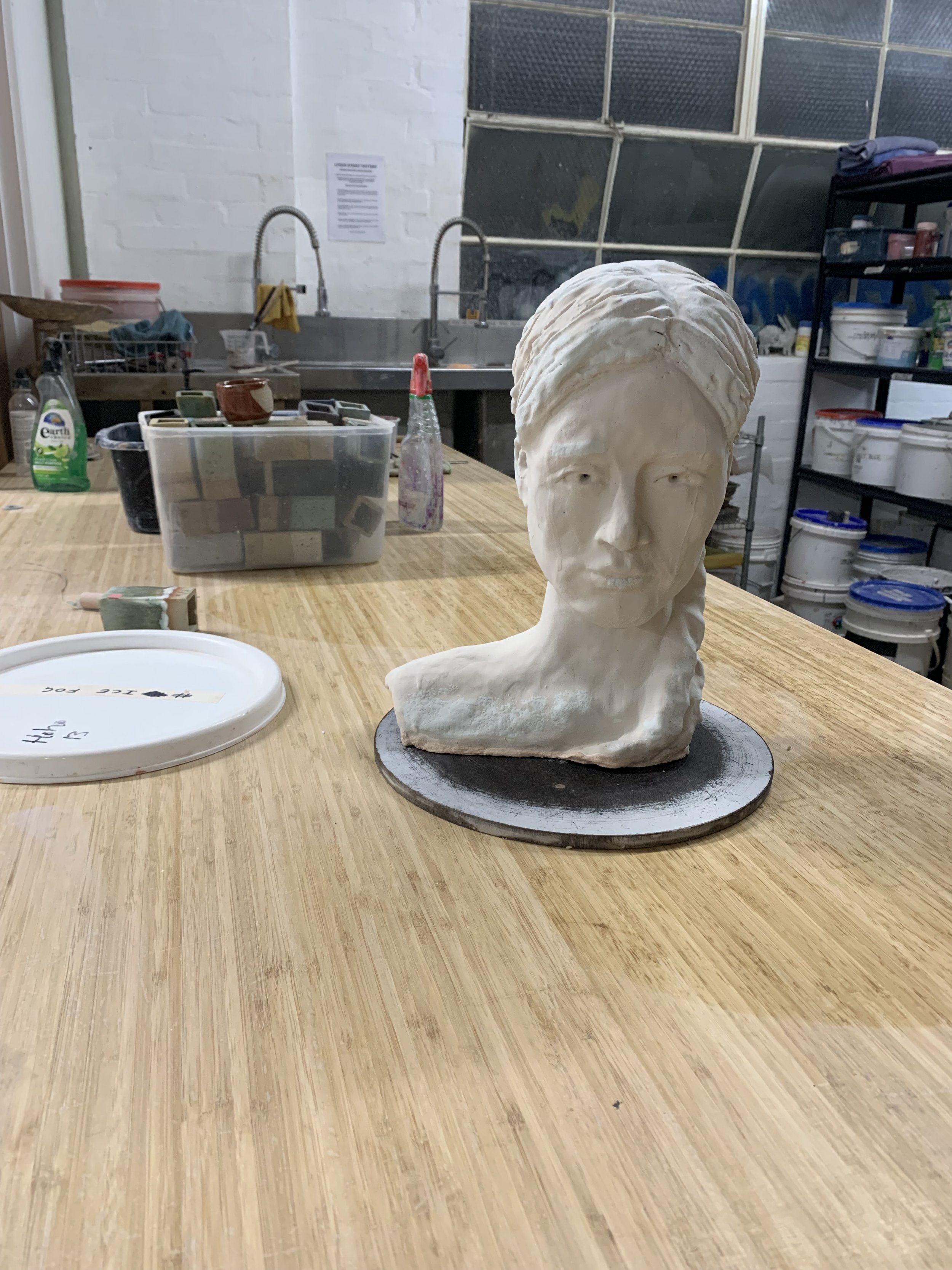 Bust in progress, glazed but not fired, 2025, Raku clay