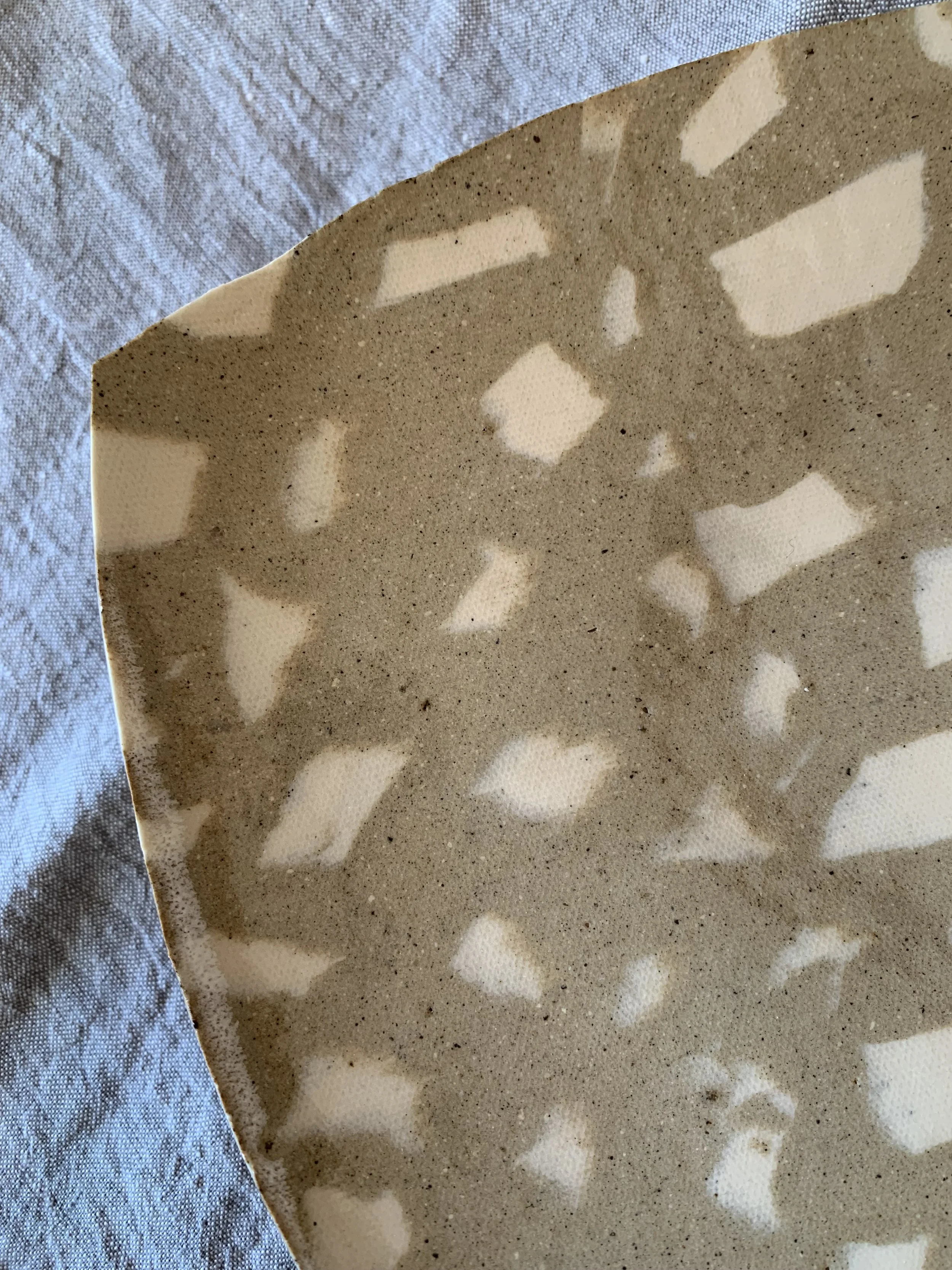 Detail of sculptural squared Nerikomi serving dish, clear glazed stoneware