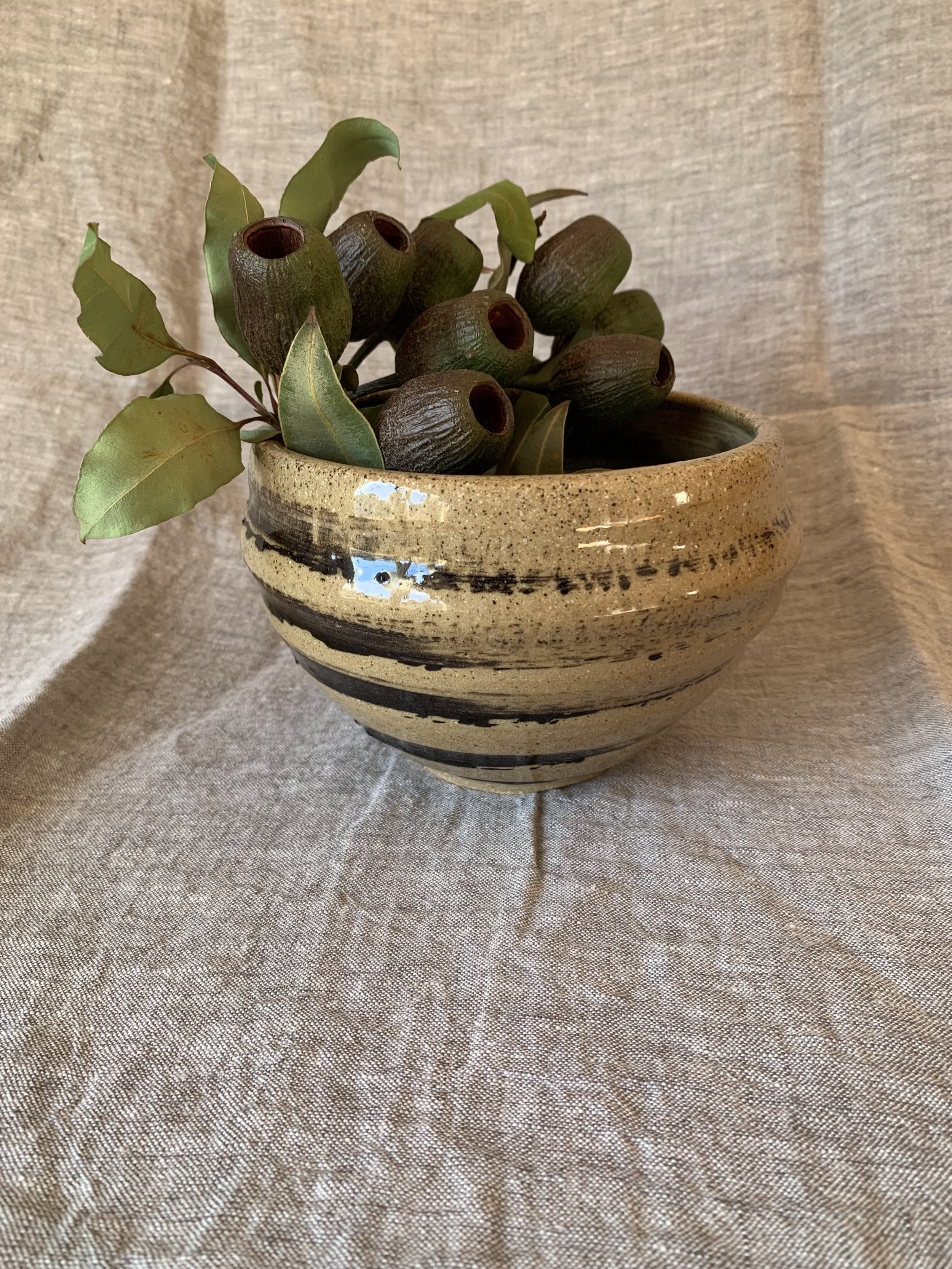Deep slip-decorated stoneware bow