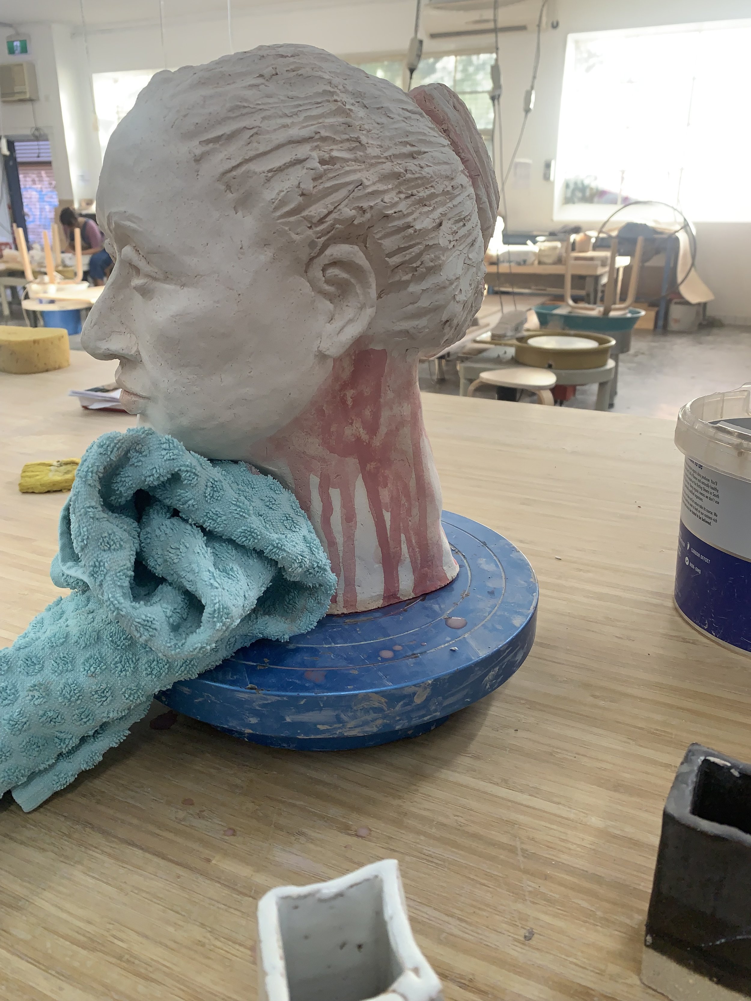 Bust in progress, glazed but not fired, 2025, Raku clay
