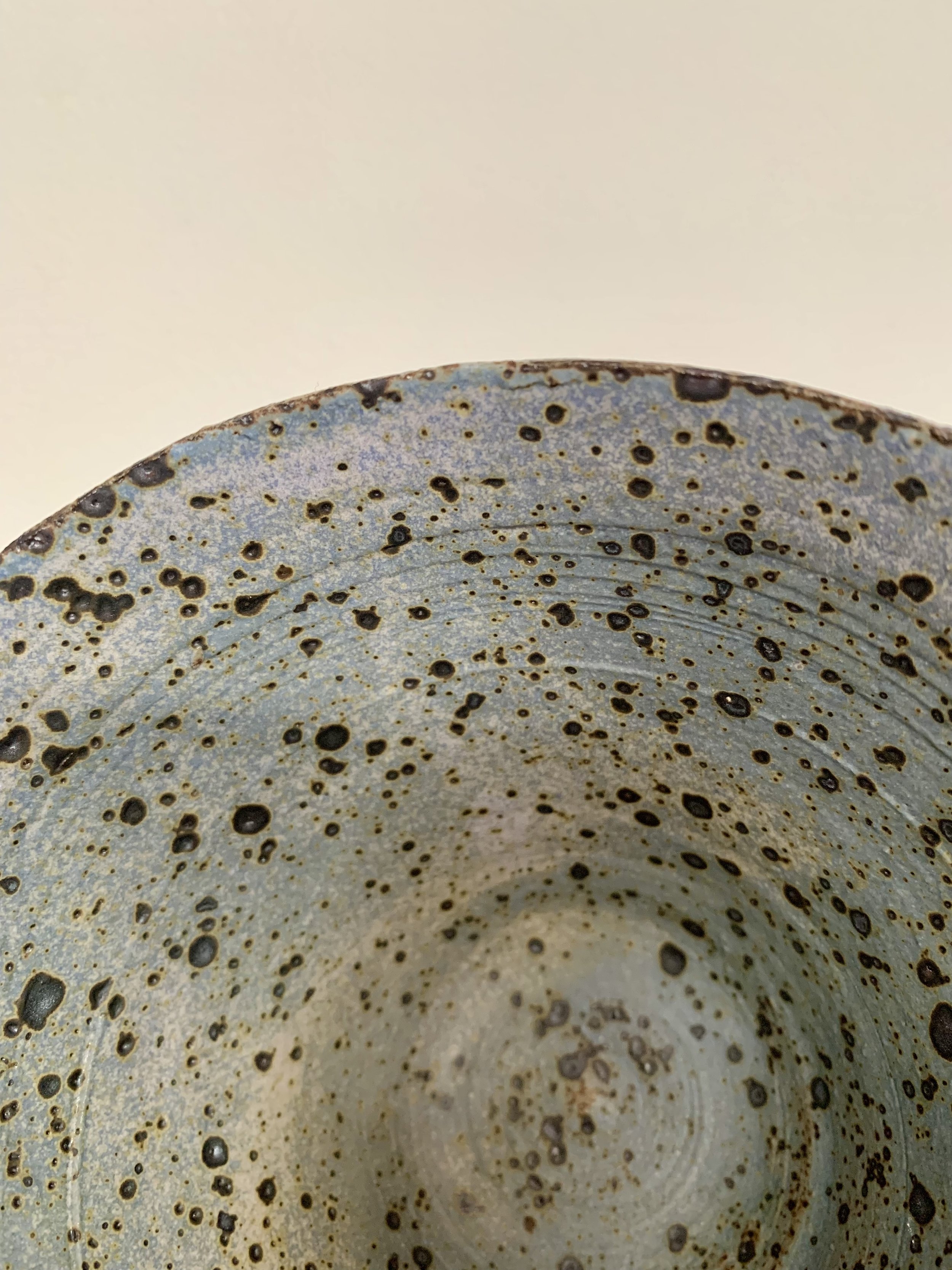 Detail of medium footed bowl, reduction fired stoneware