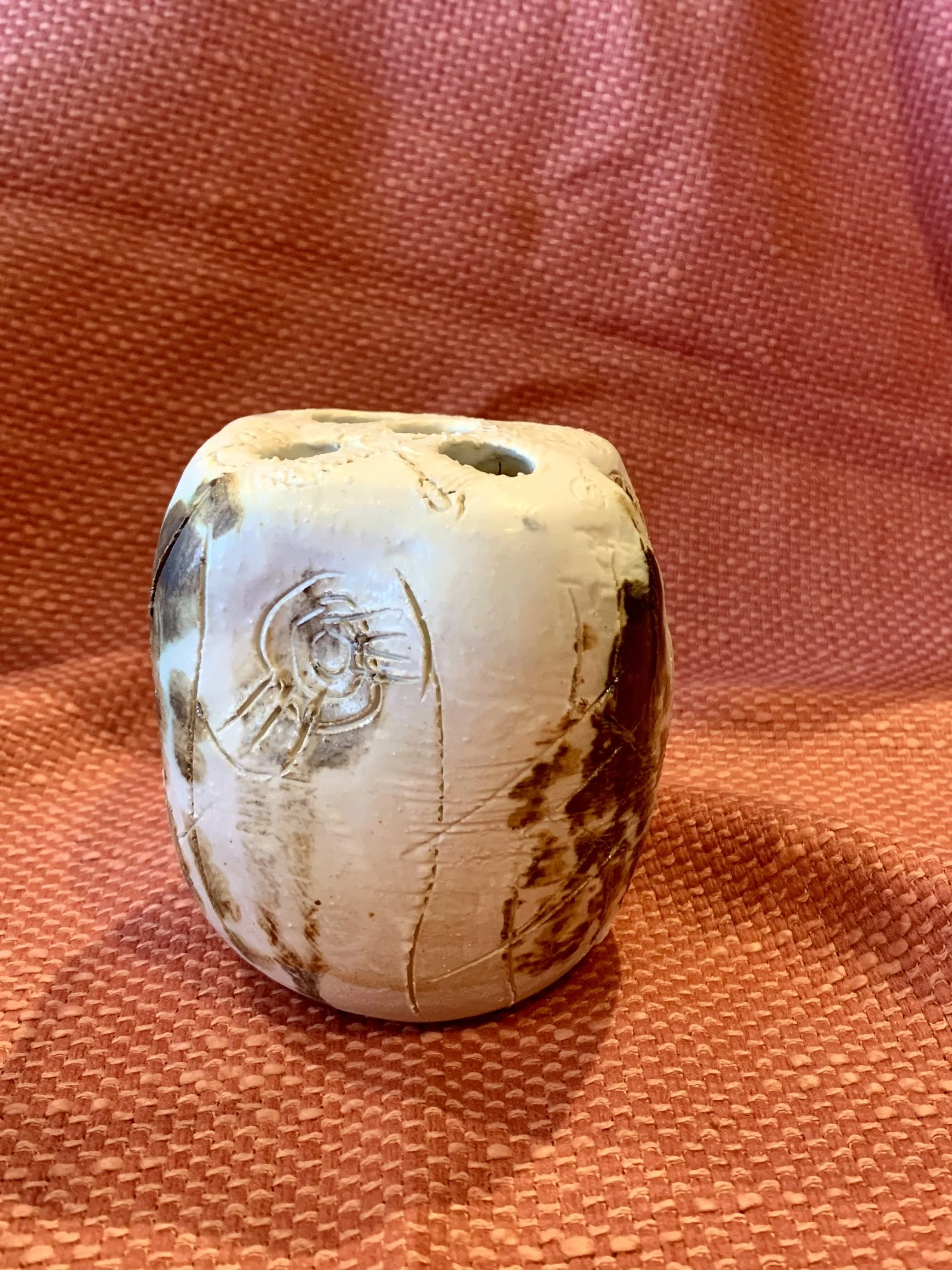 Thrown and altered stem vase with texture and oxide colouring