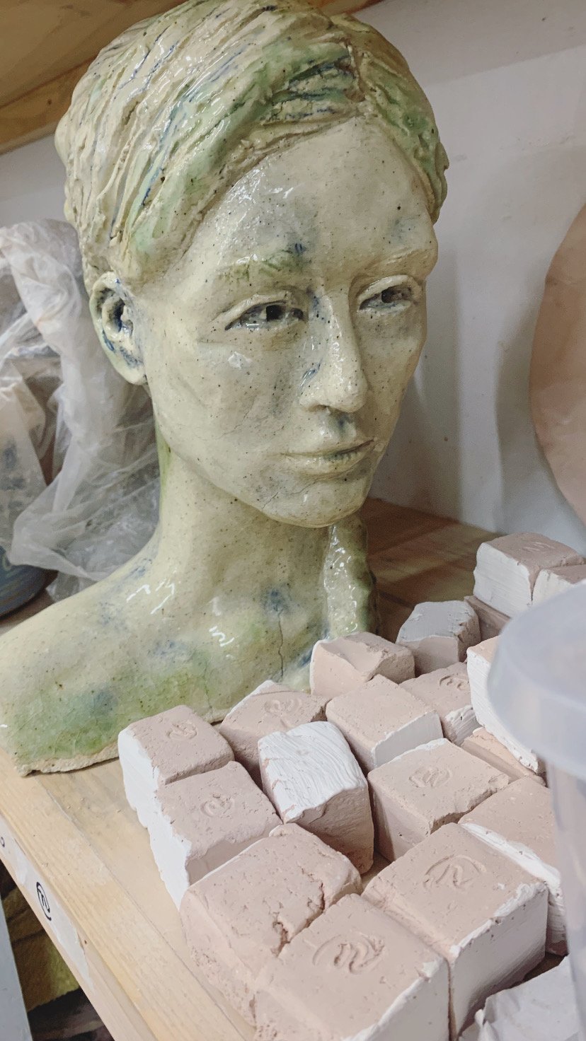 Bust, 2025, Underglaze and glazed Raku clay