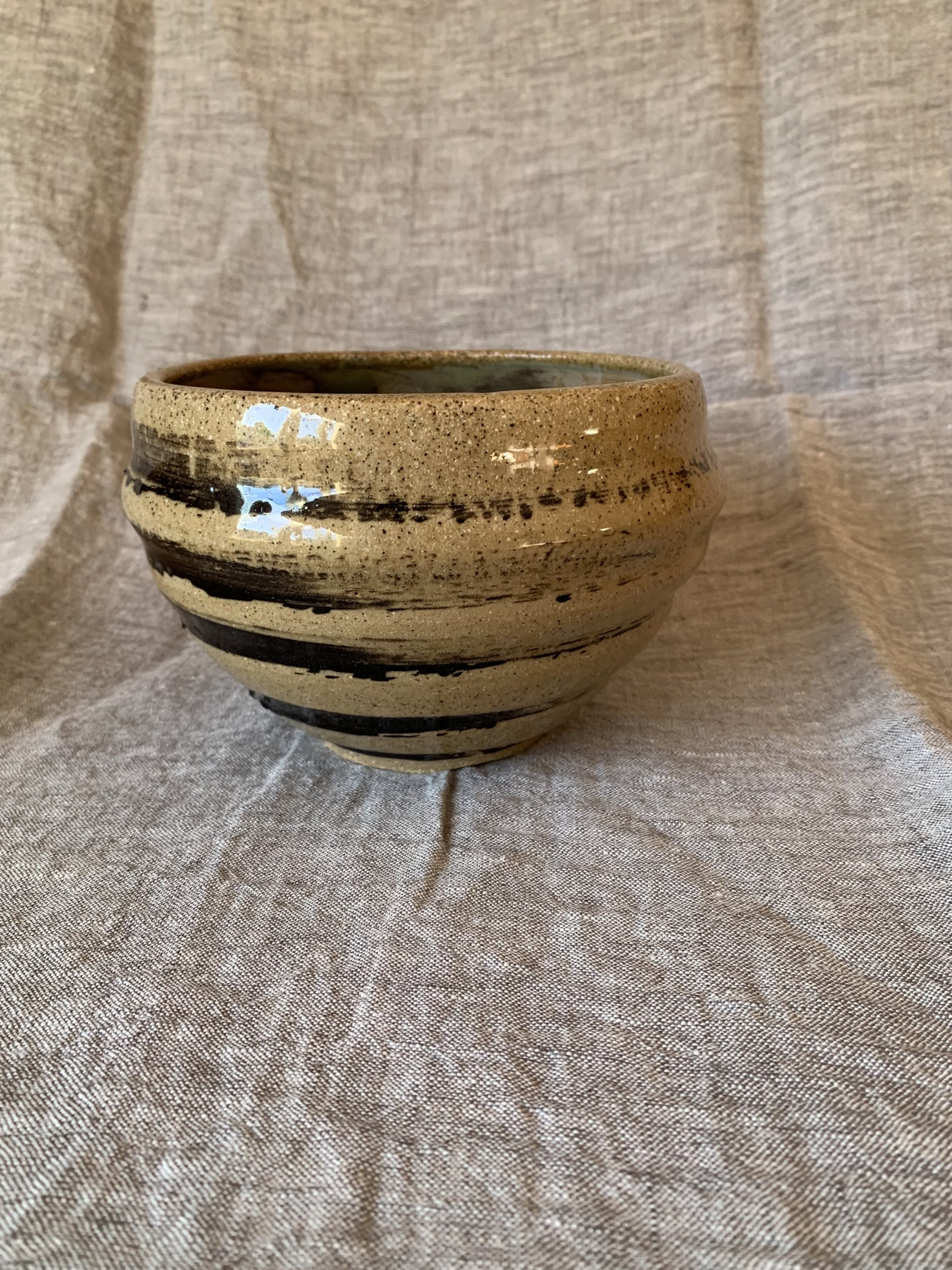 Deep slip-decorated stoneware bowl