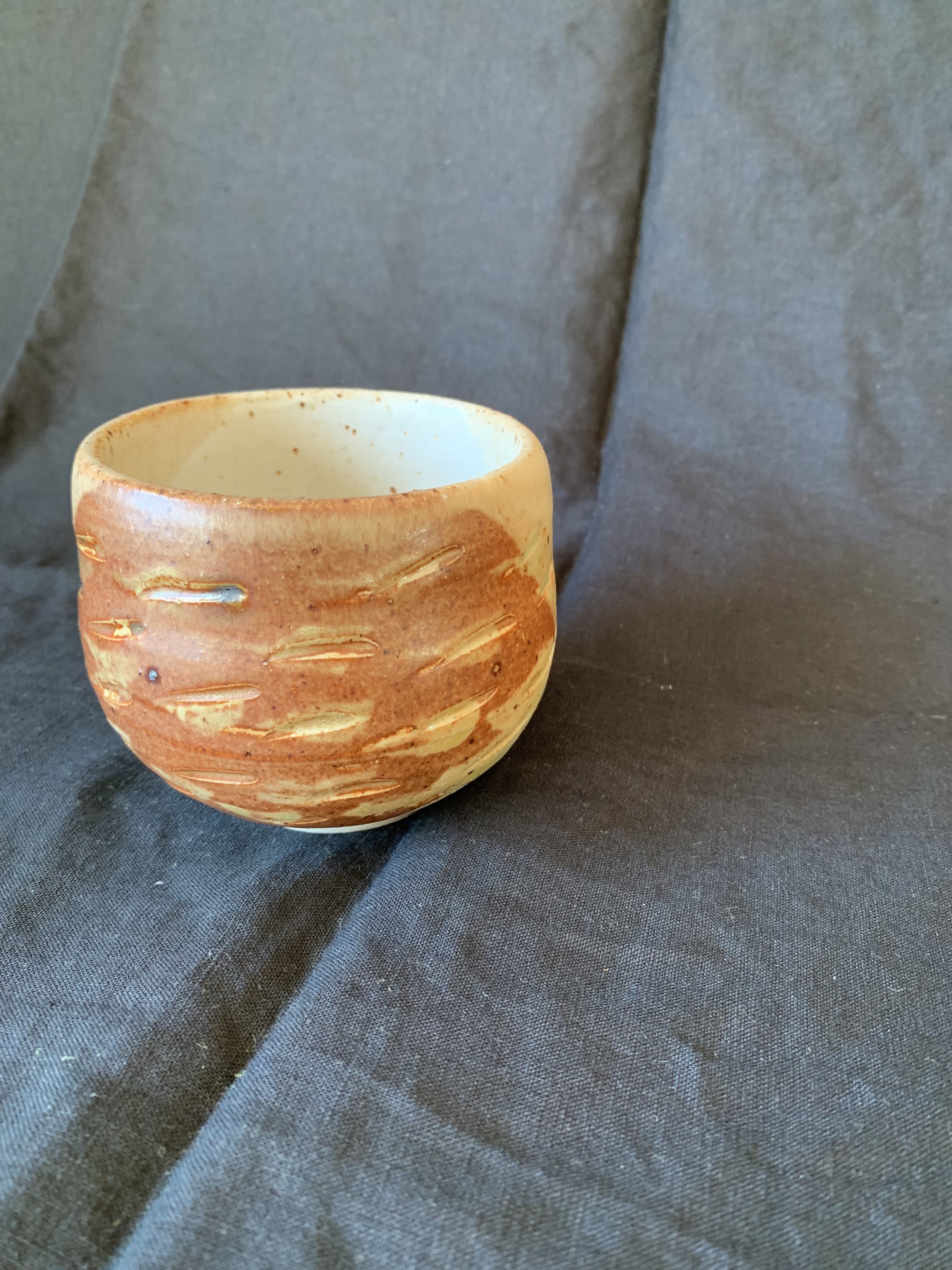 Stoneware cup decorated with oxides made from reclaimed metals