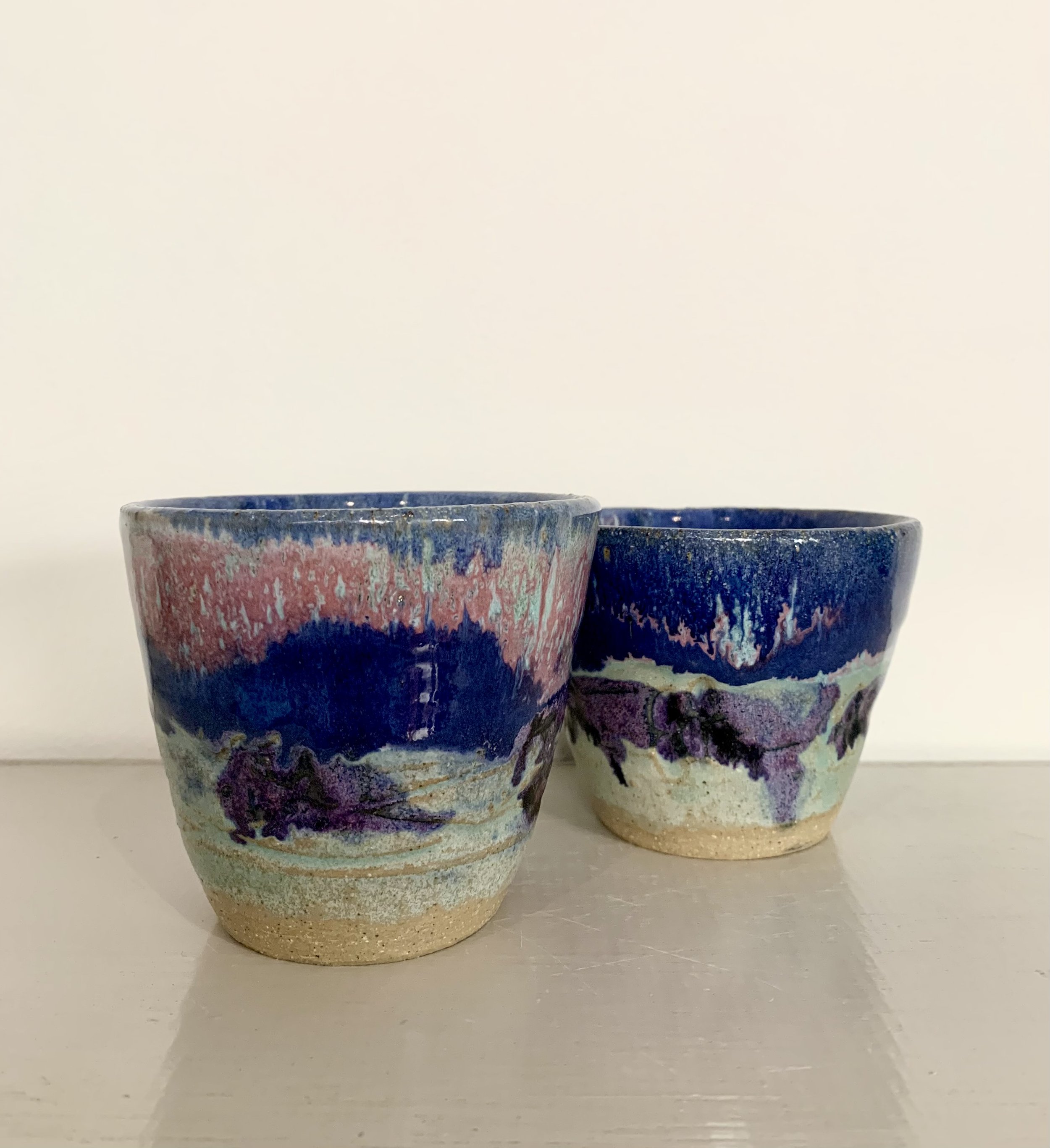 Pink and blue tumblers, glazed stoneware