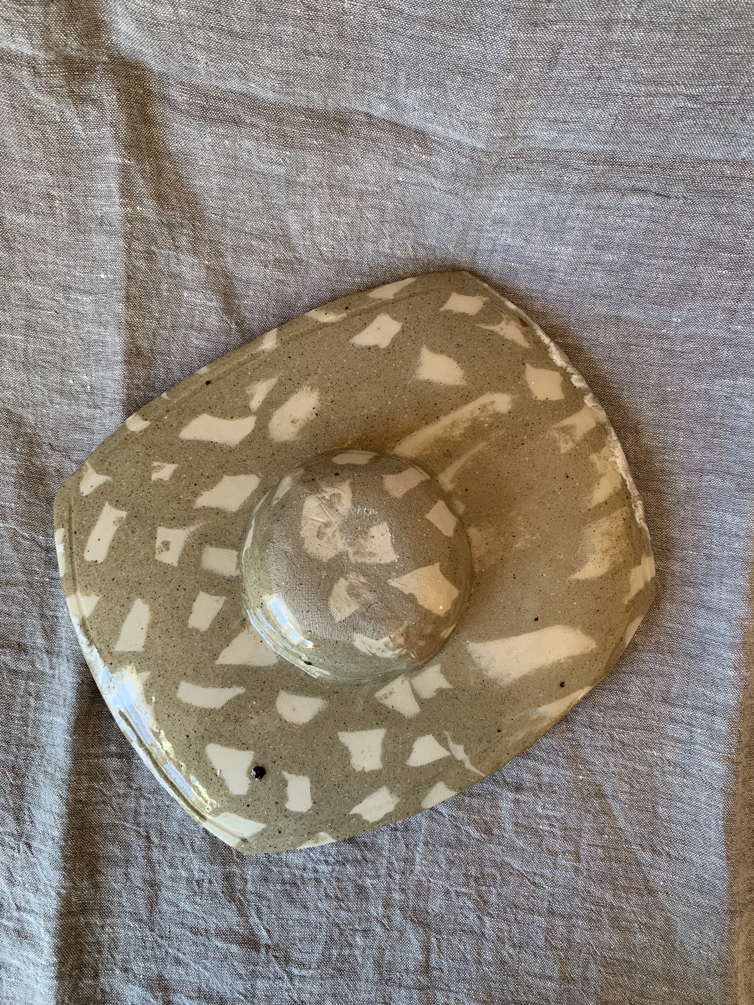 Underside of sculptural squared Nerikomi serving dish, clear glazed stoneware