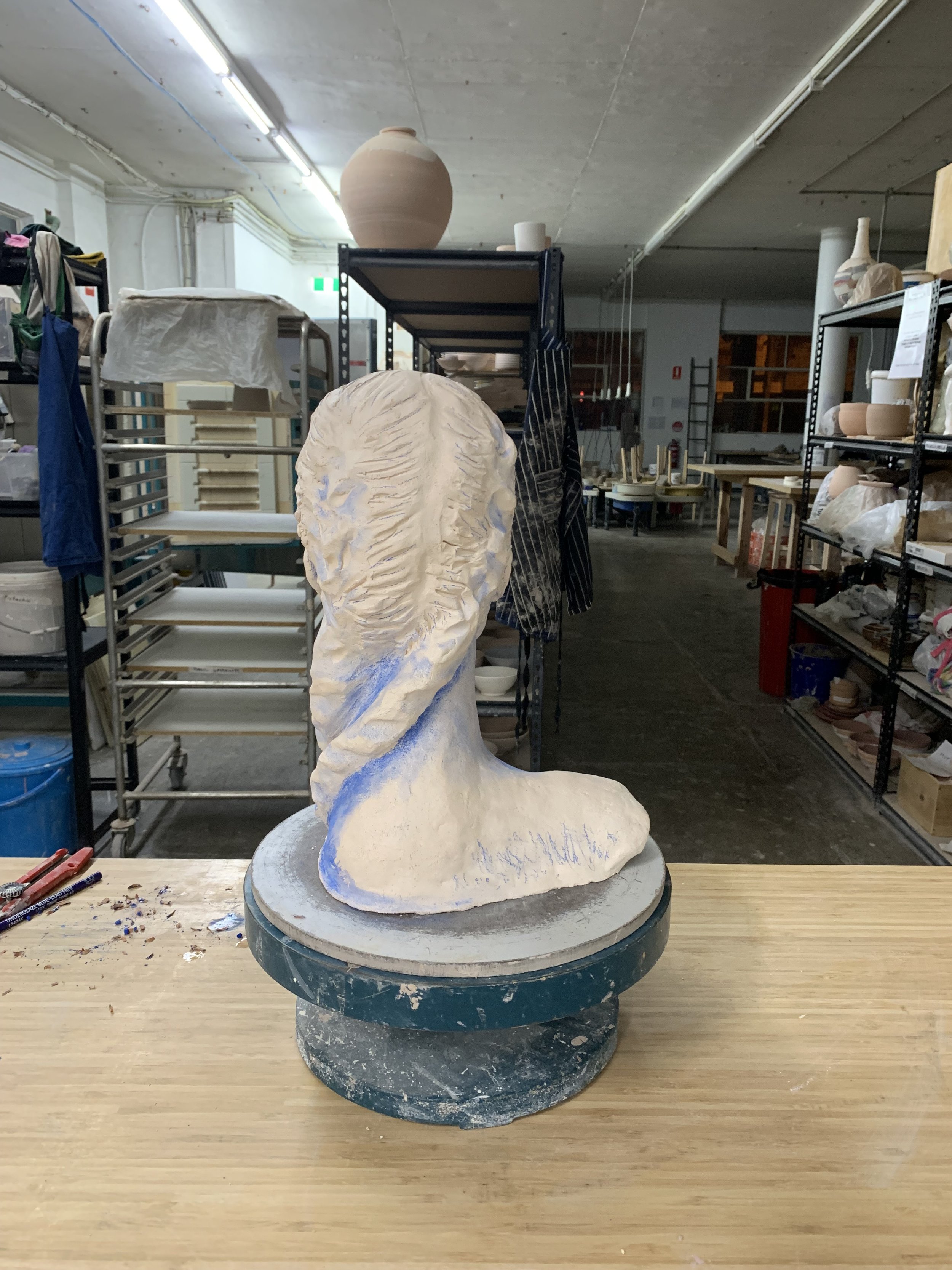 Bust in progress, underglazing, 2025, Raku clay