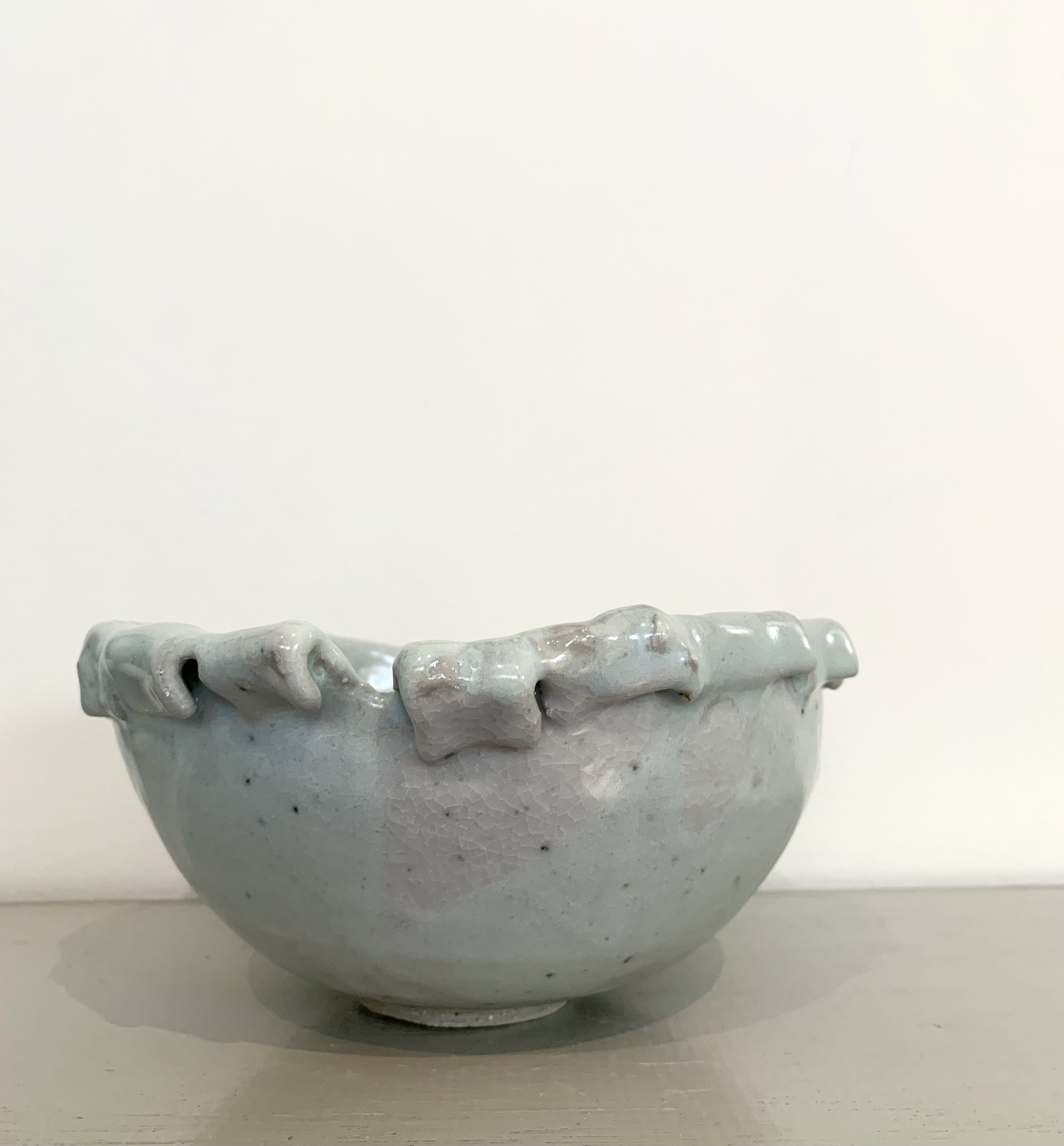 Medium fold-edged footed bowl, shino and ash glazed stoneware