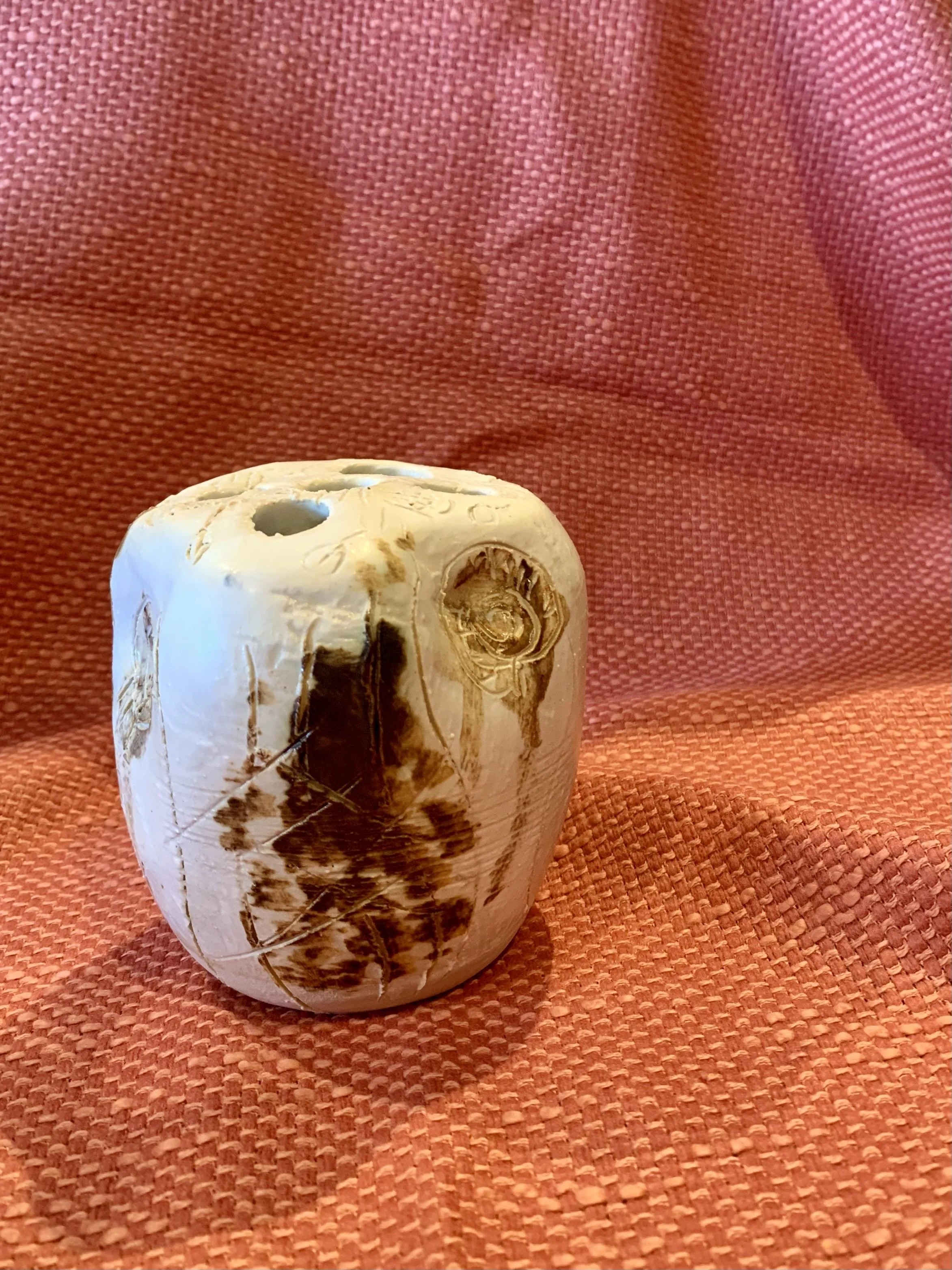 Thrown and altered stem vase with texture and oxide colouring