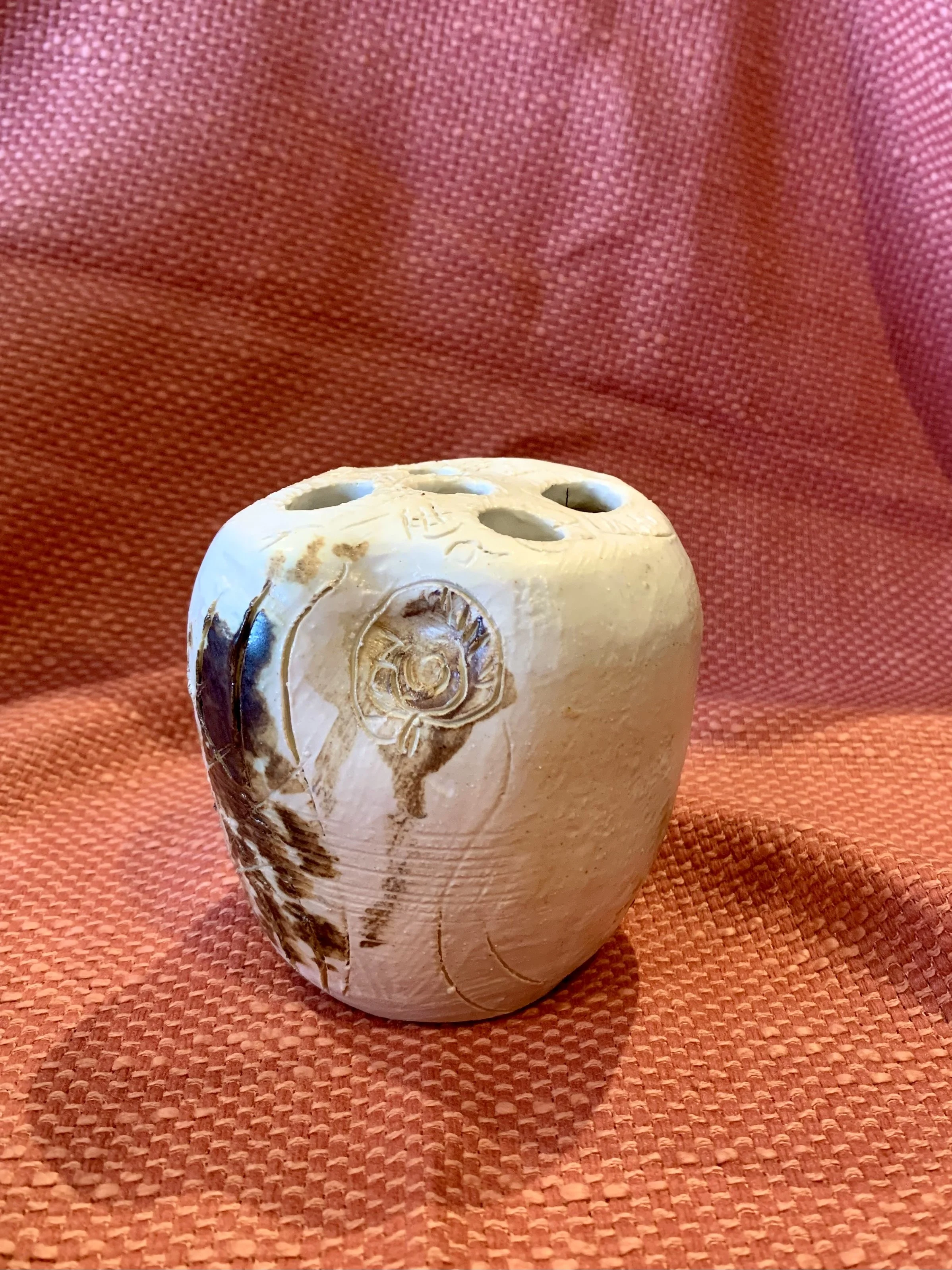 Thrown and altered stem vase with texture and oxide colouring