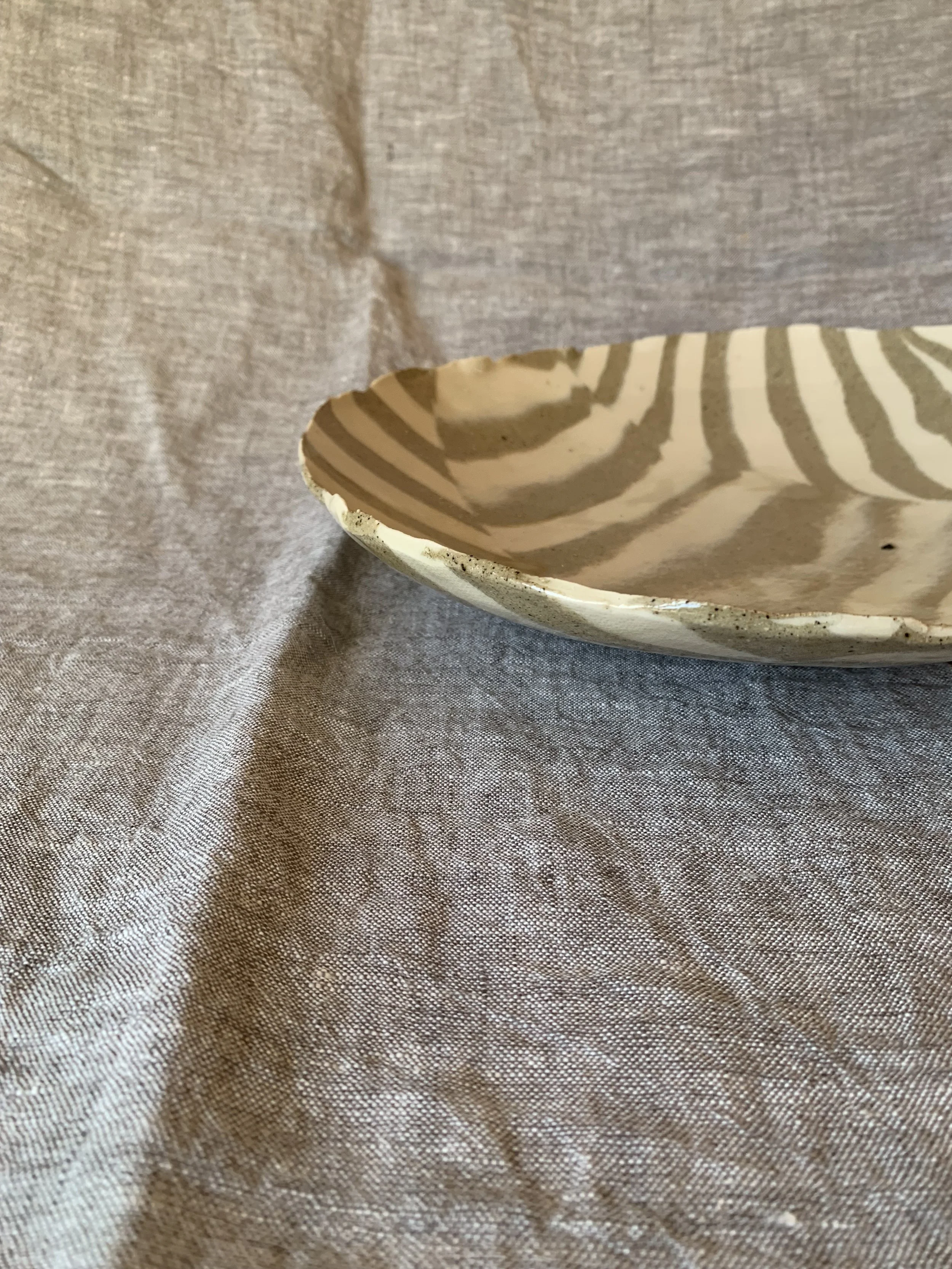 Striped Nerikomi serving dish, clear glazed stoneware