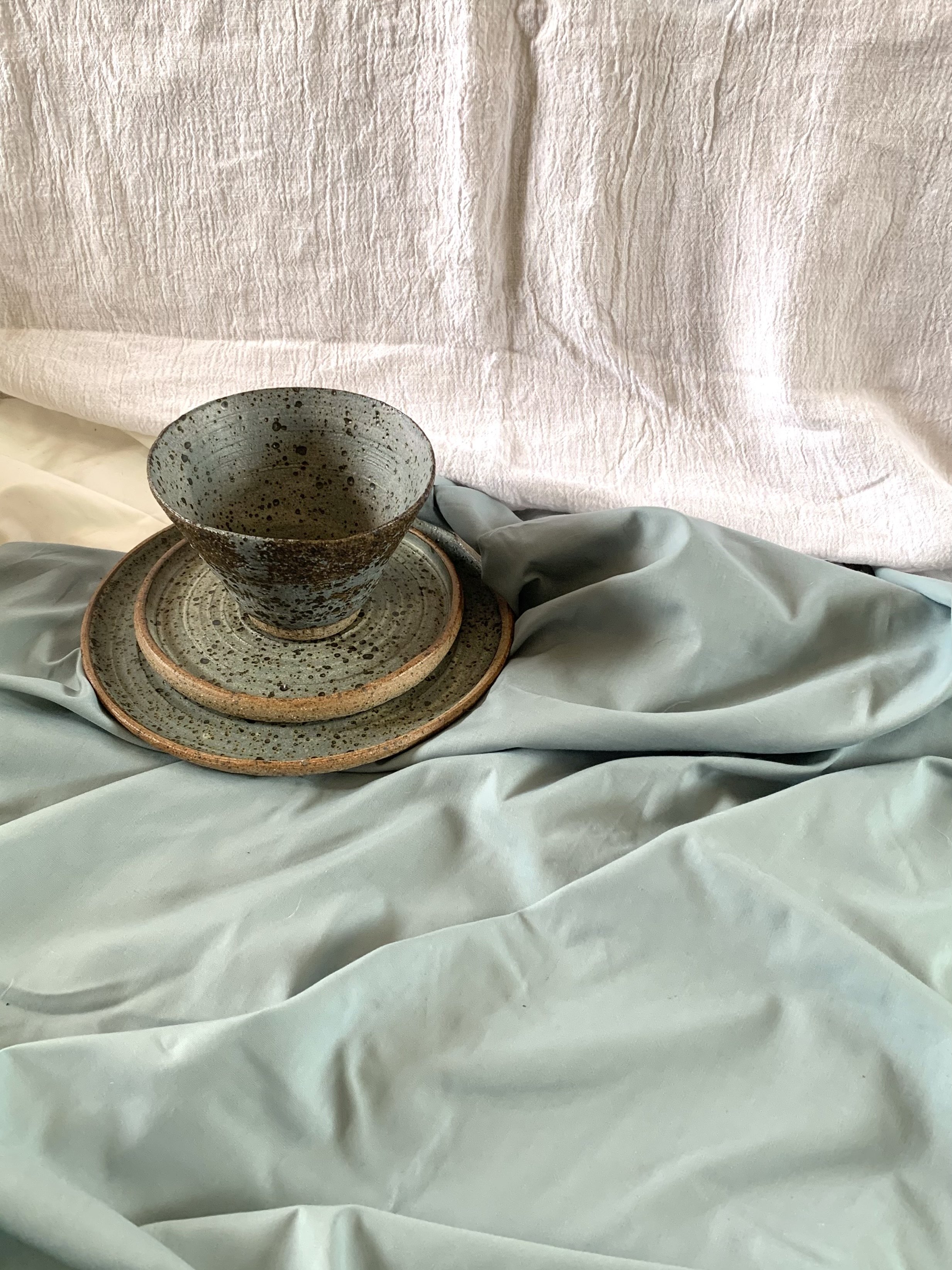 Medium footed bowl, side plate, and dinner plate, reduction fired stoneware