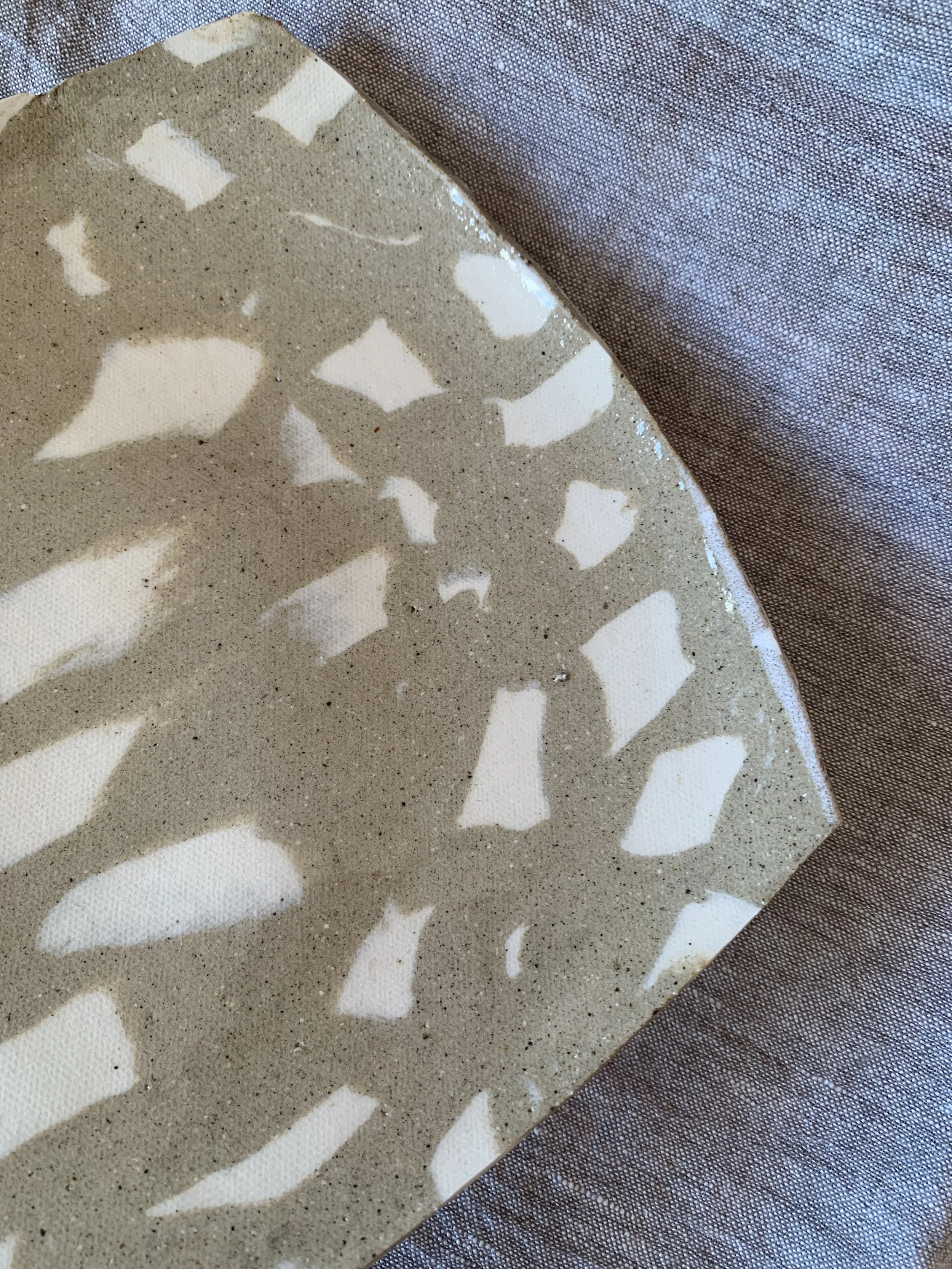 Detail of sculptural squared Nerikomi serving dish, clear glazed stoneware