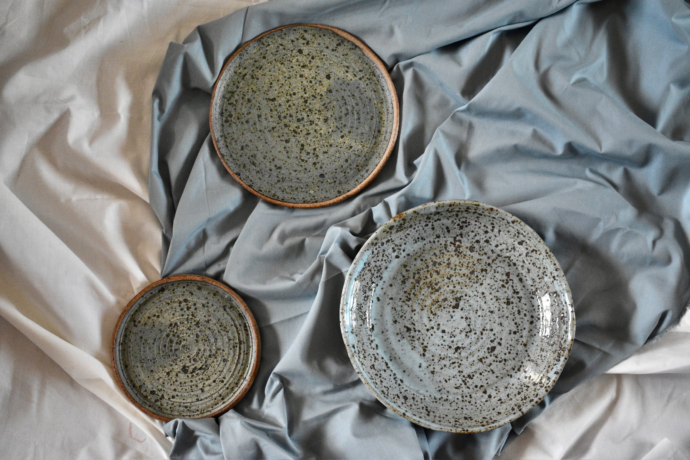 Side plate, dinner plate, and serving dish, reduction fired stoneware