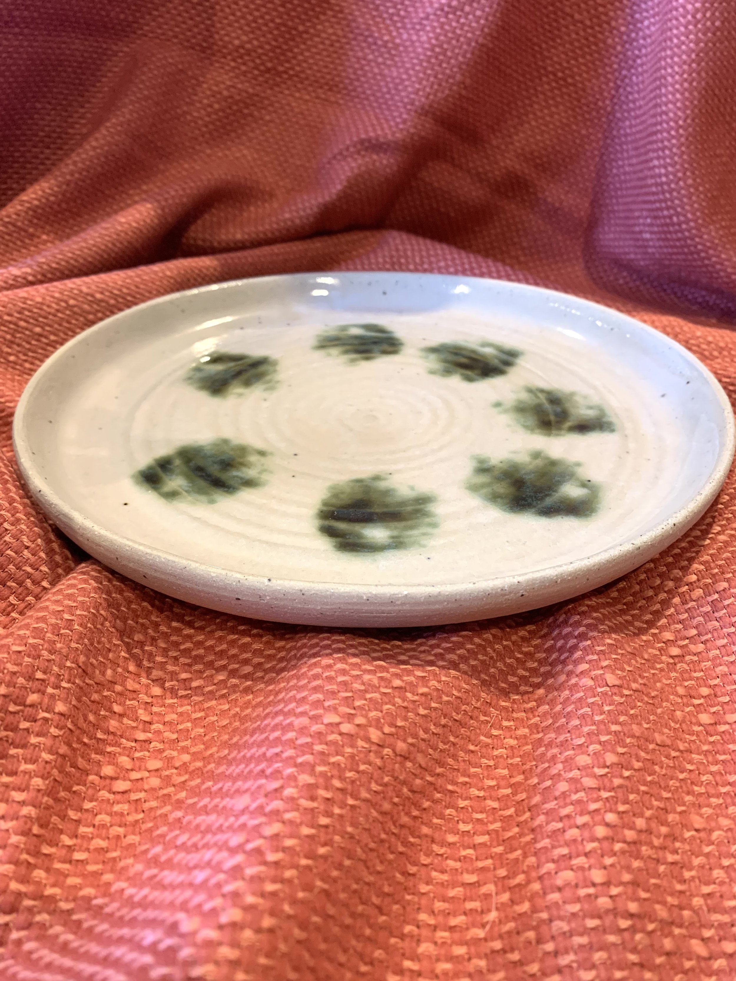 Serving plate with copper oxide decoration on shino and ash glazed stoneware