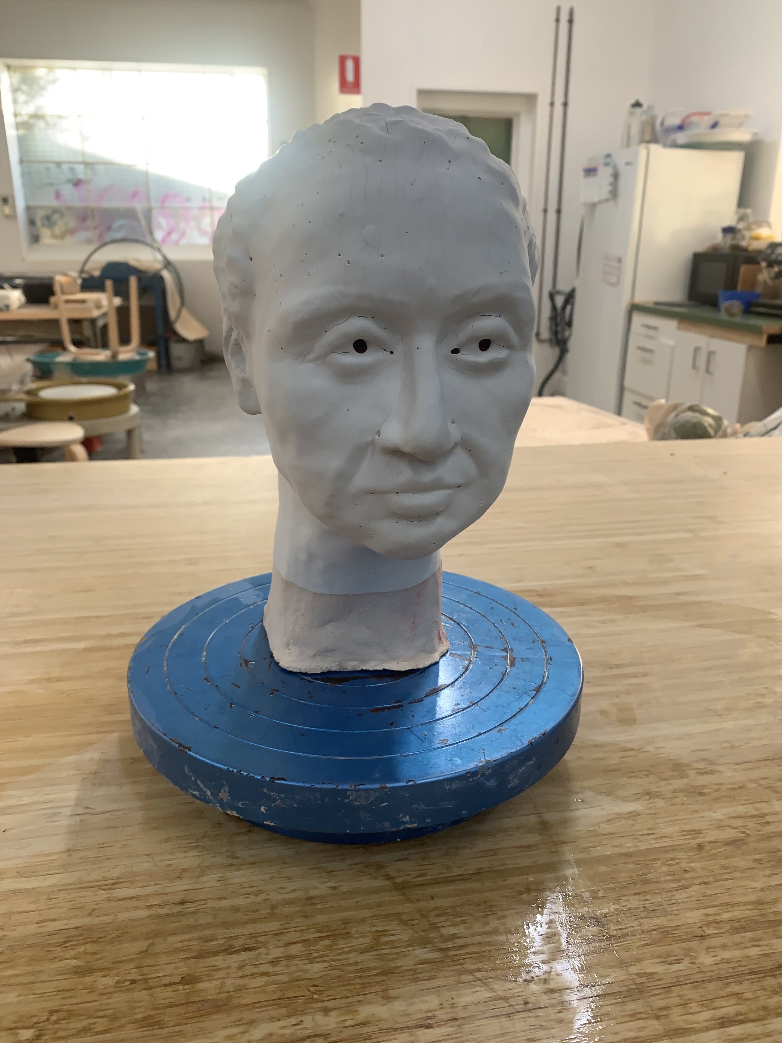 Bust in progress, glazed but not fired, 2025, Raku clay