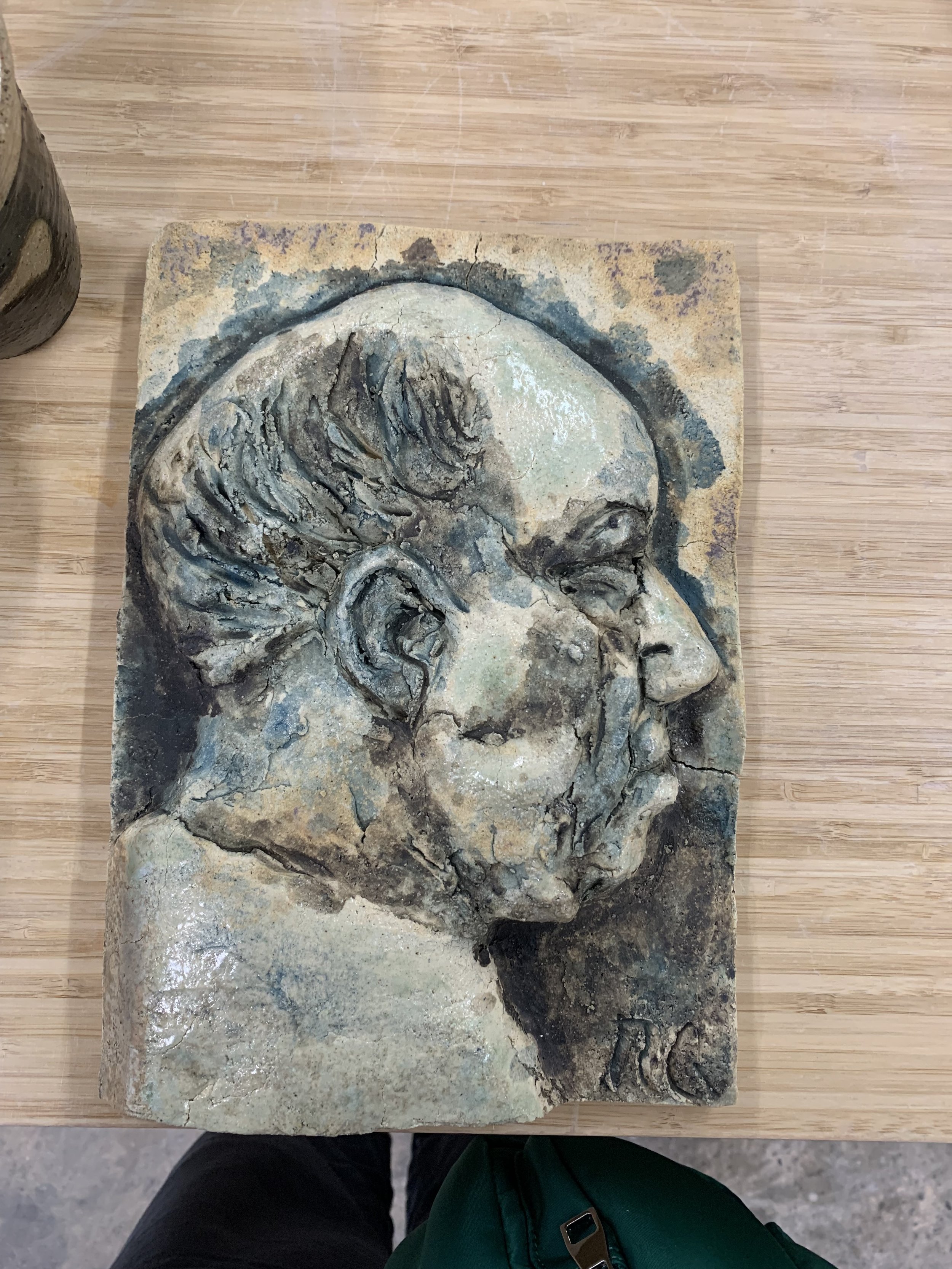 Profile relief, 2024, Raku clay, coloured slips, oxides, and glaze