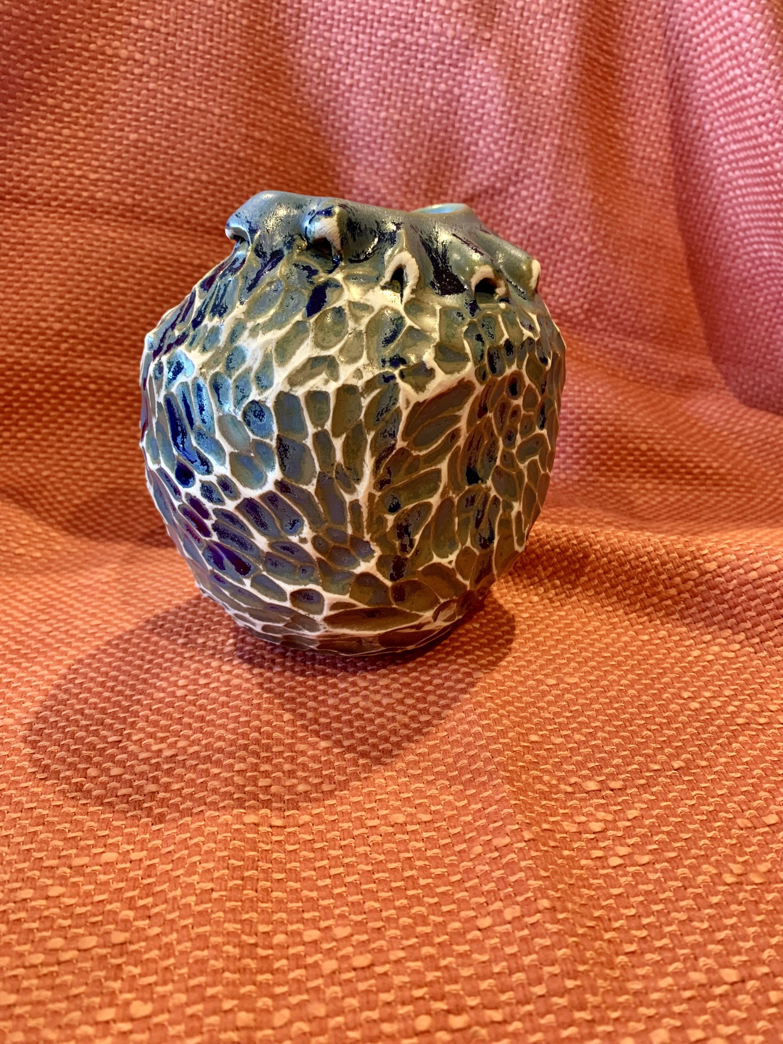 Frill necked and softly faceted thrown and altered vase, glazed stoneware
