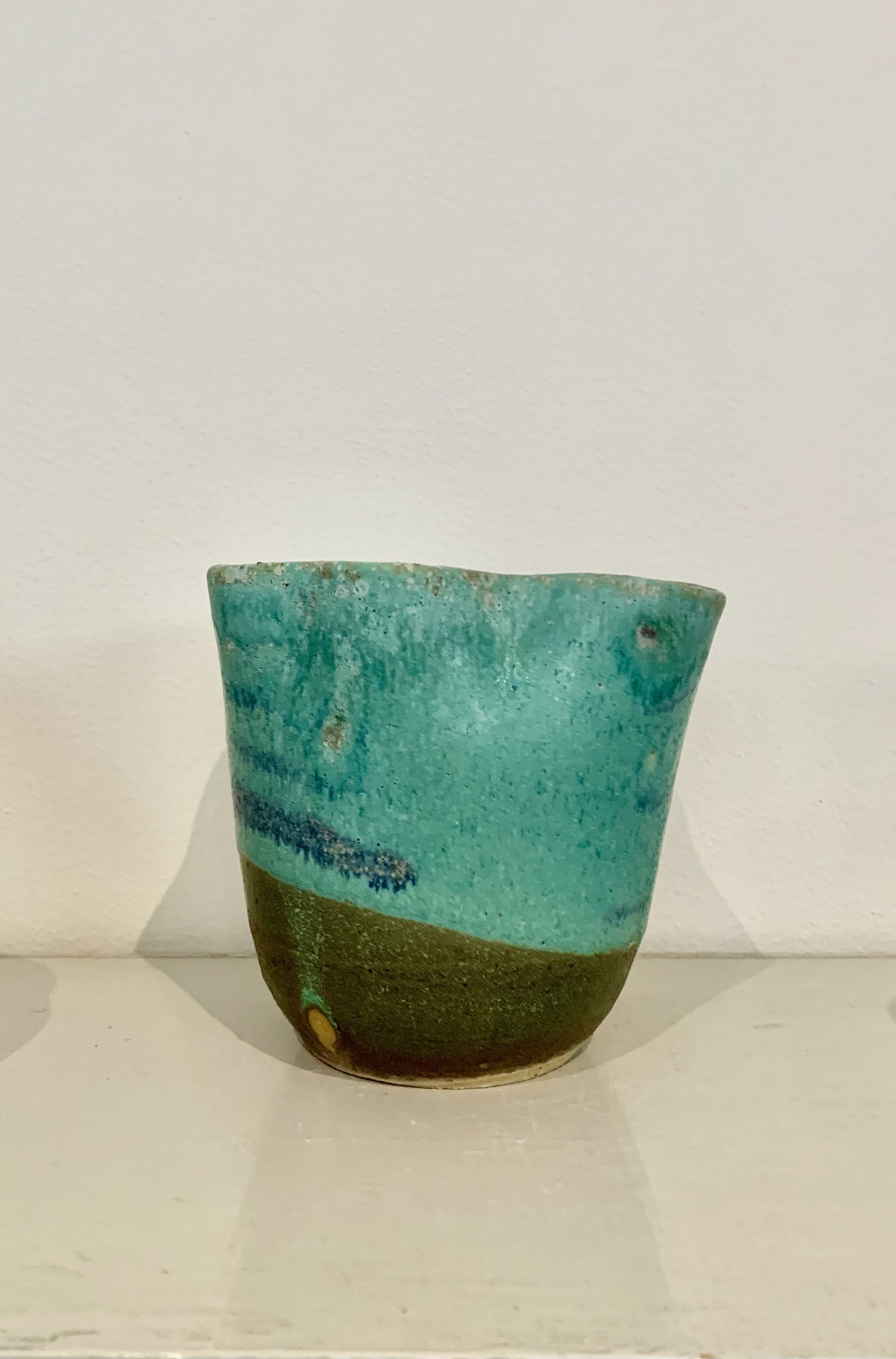 Thrown and altered bronzed green stoneware vase