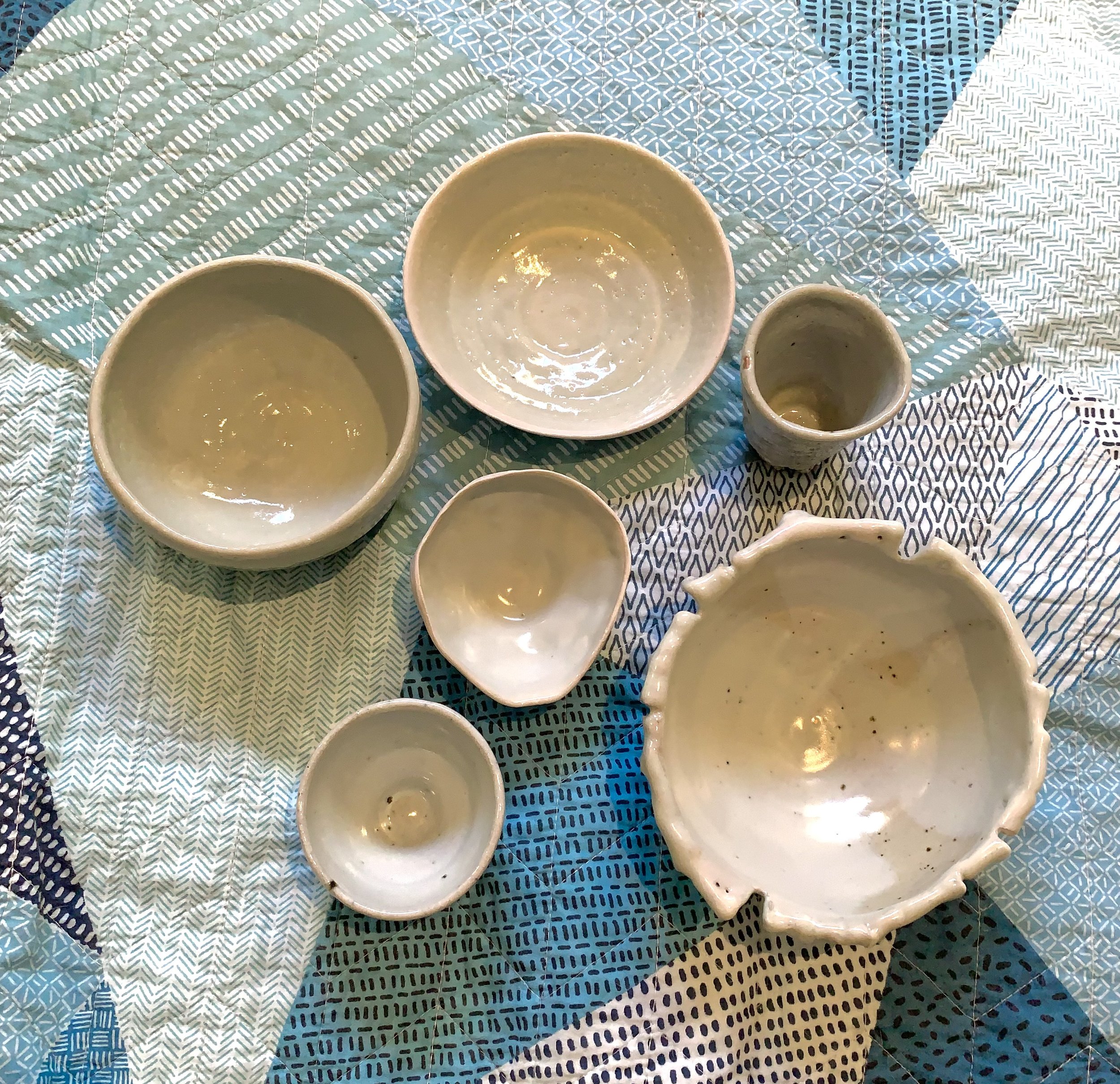 Collection of shino and ash glazed stoneware vessels